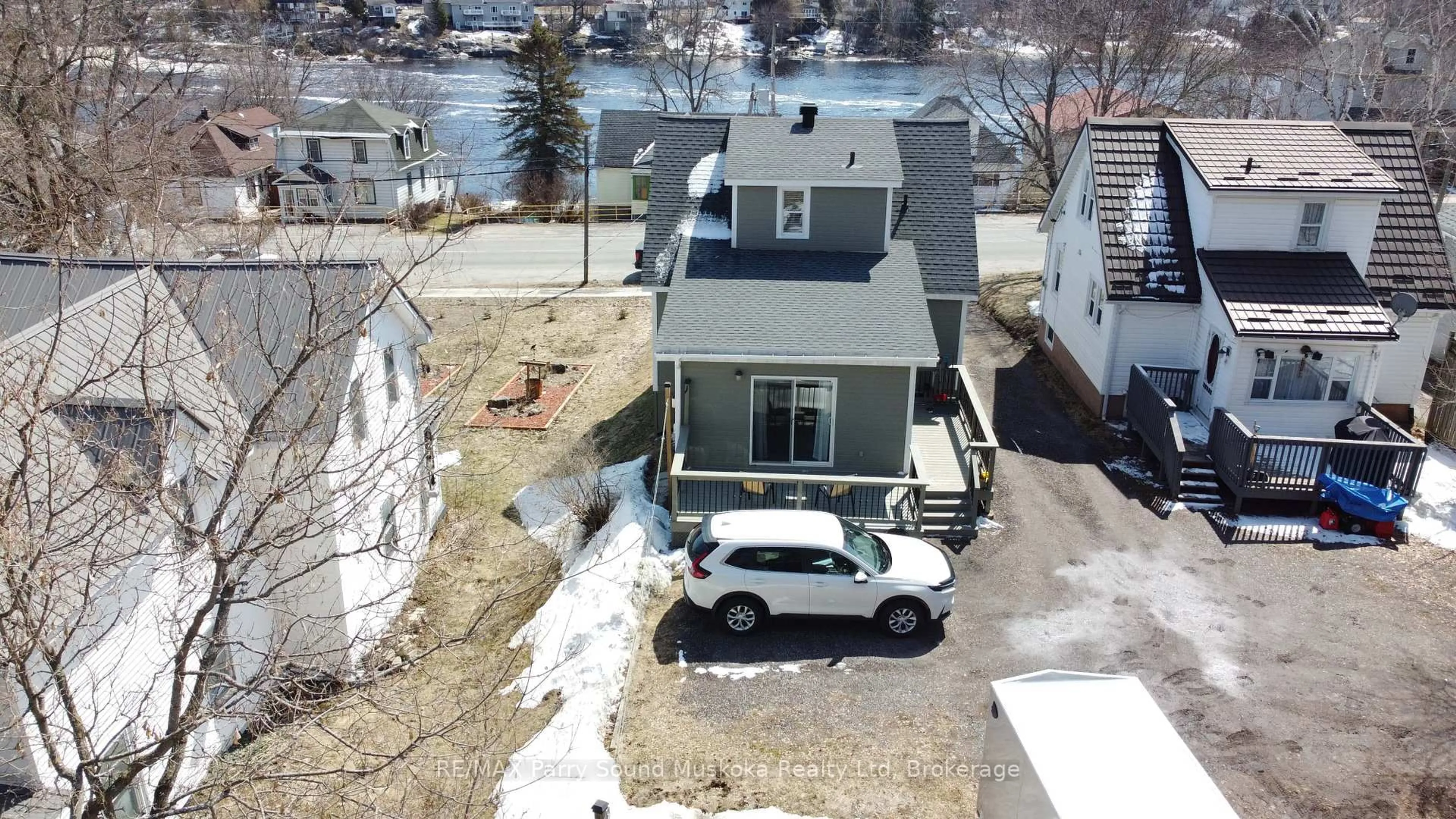 A pic from outside/outdoor area/front of a property/back of a property/a pic from drone, water/lake/river/ocean view for 60 William St, Parry Sound Ontario P2A 1V1