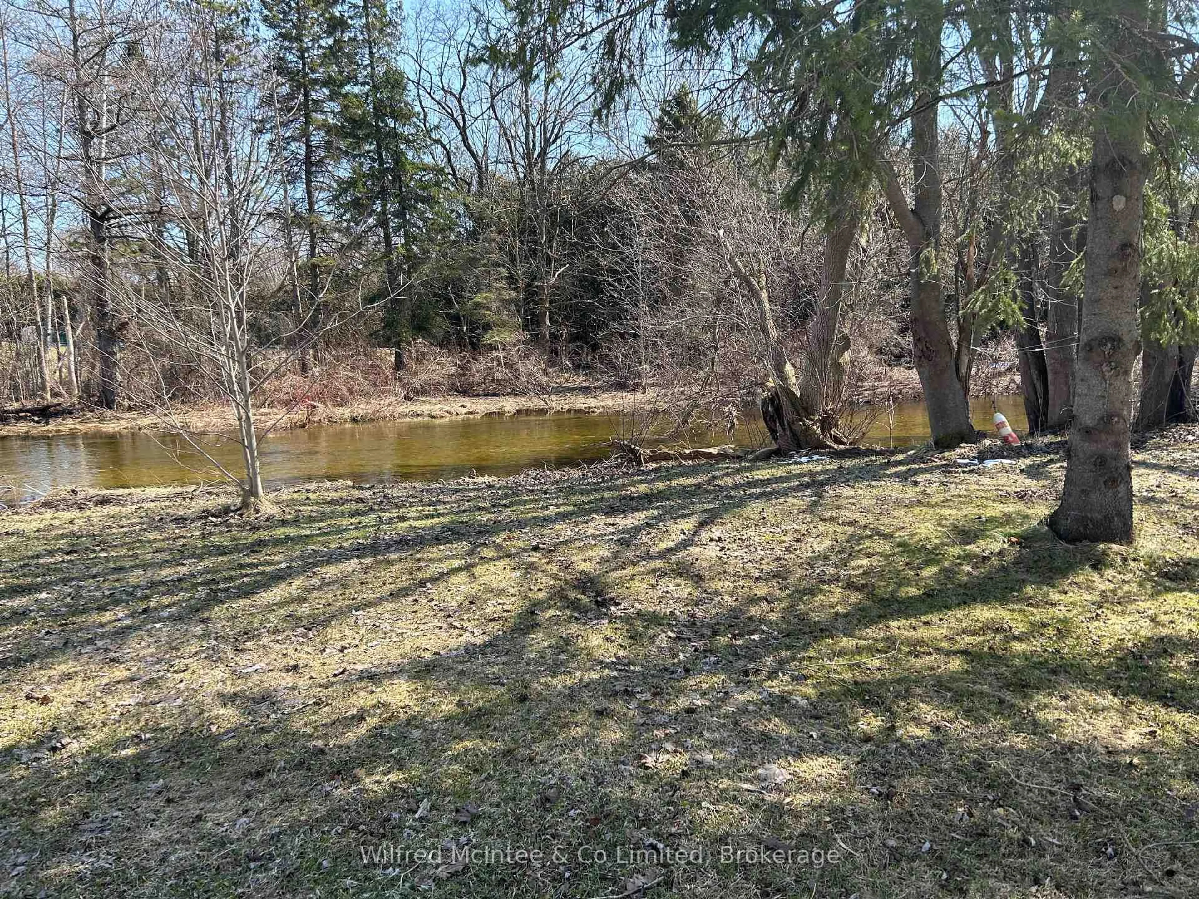 A pic from outside/outdoor area/front of a property/back of a property/a pic from drone, water/lake/river/ocean view for 401866 Grey 4 Rd, West Grey Ontario N4N 3B8