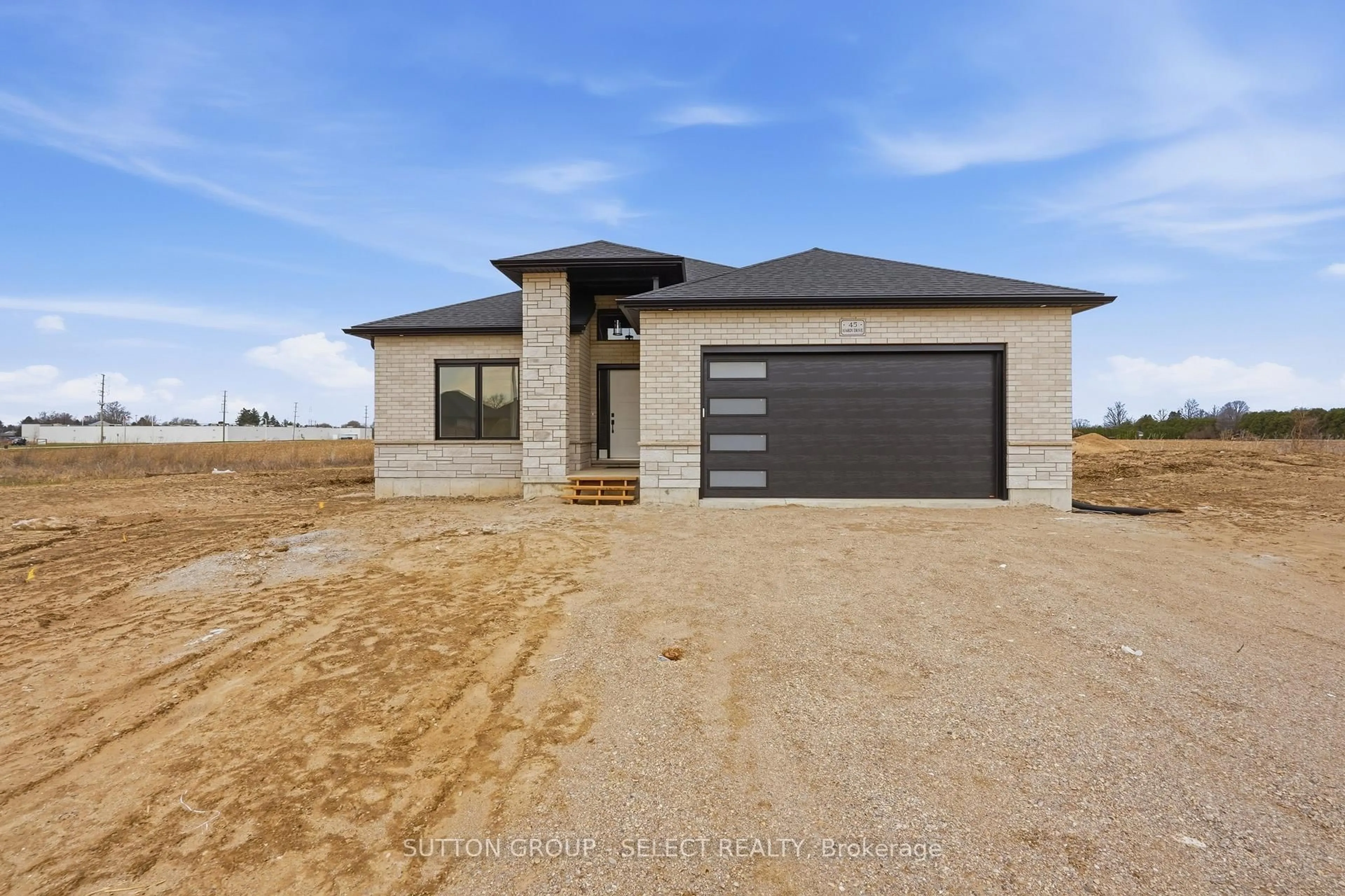 Home with brick exterior material, street for 45 Hardy Dr, Strathroy-Caradoc Ontario N7G 0G2