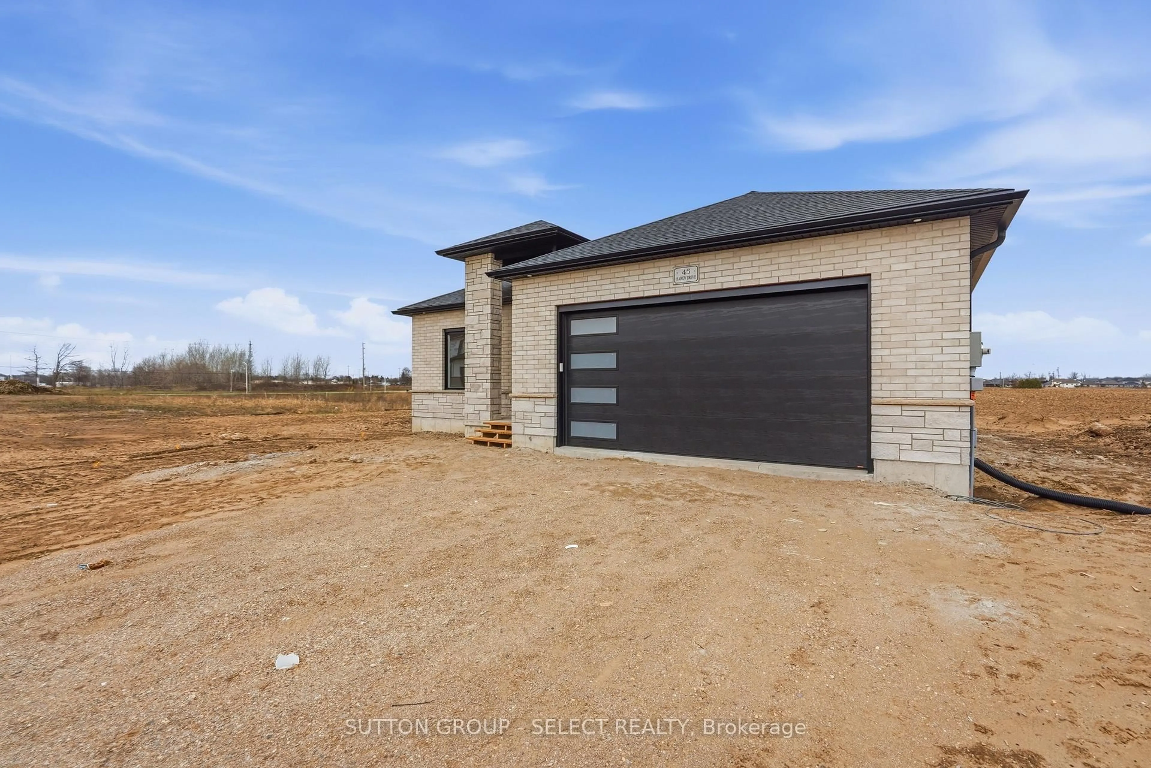 Home with brick exterior material, street for 45 Hardy Dr, Strathroy-Caradoc Ontario N7G 0G2
