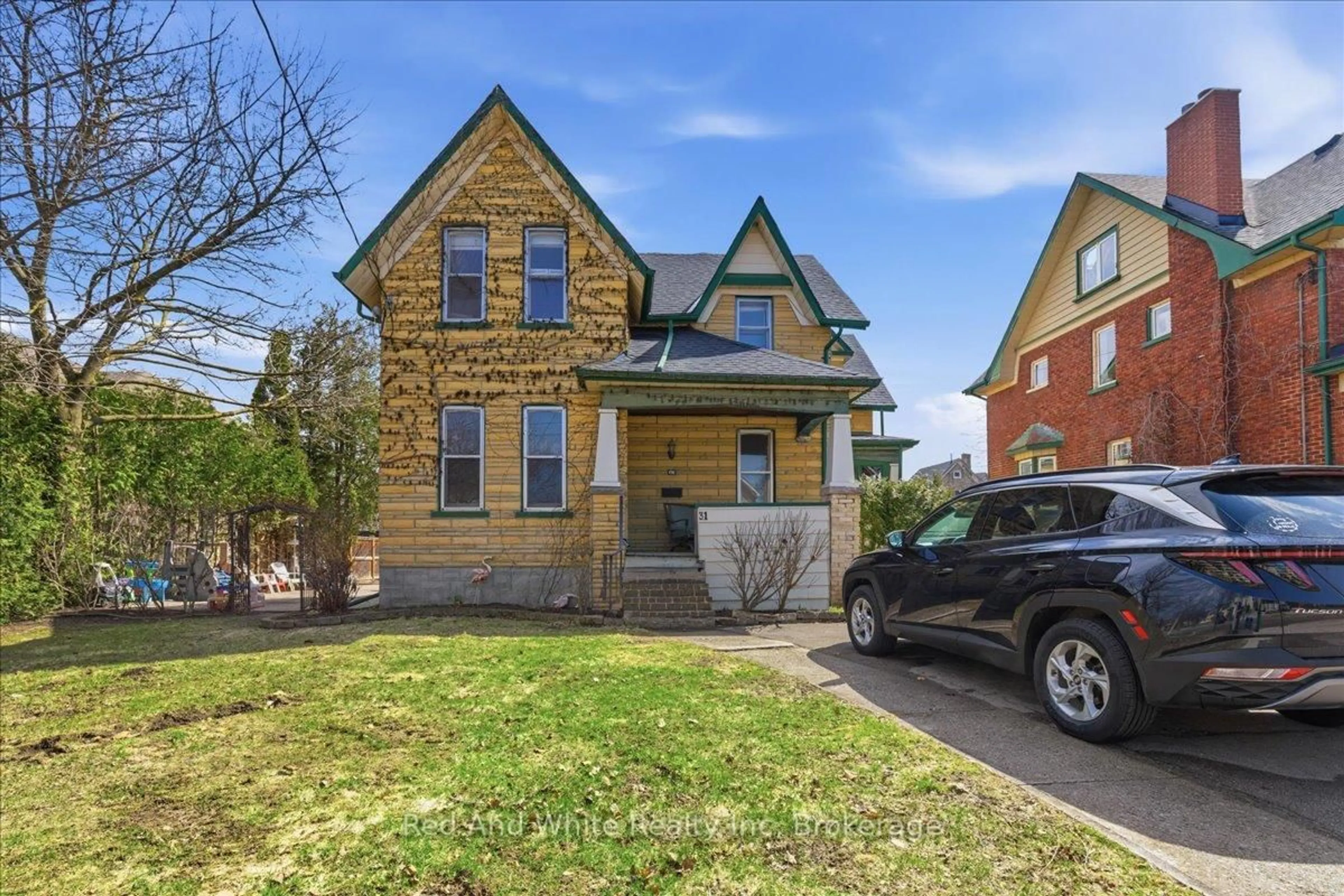 Home with brick exterior material, street for 31 Bingeman St, Kitchener Ontario N2H 2R7