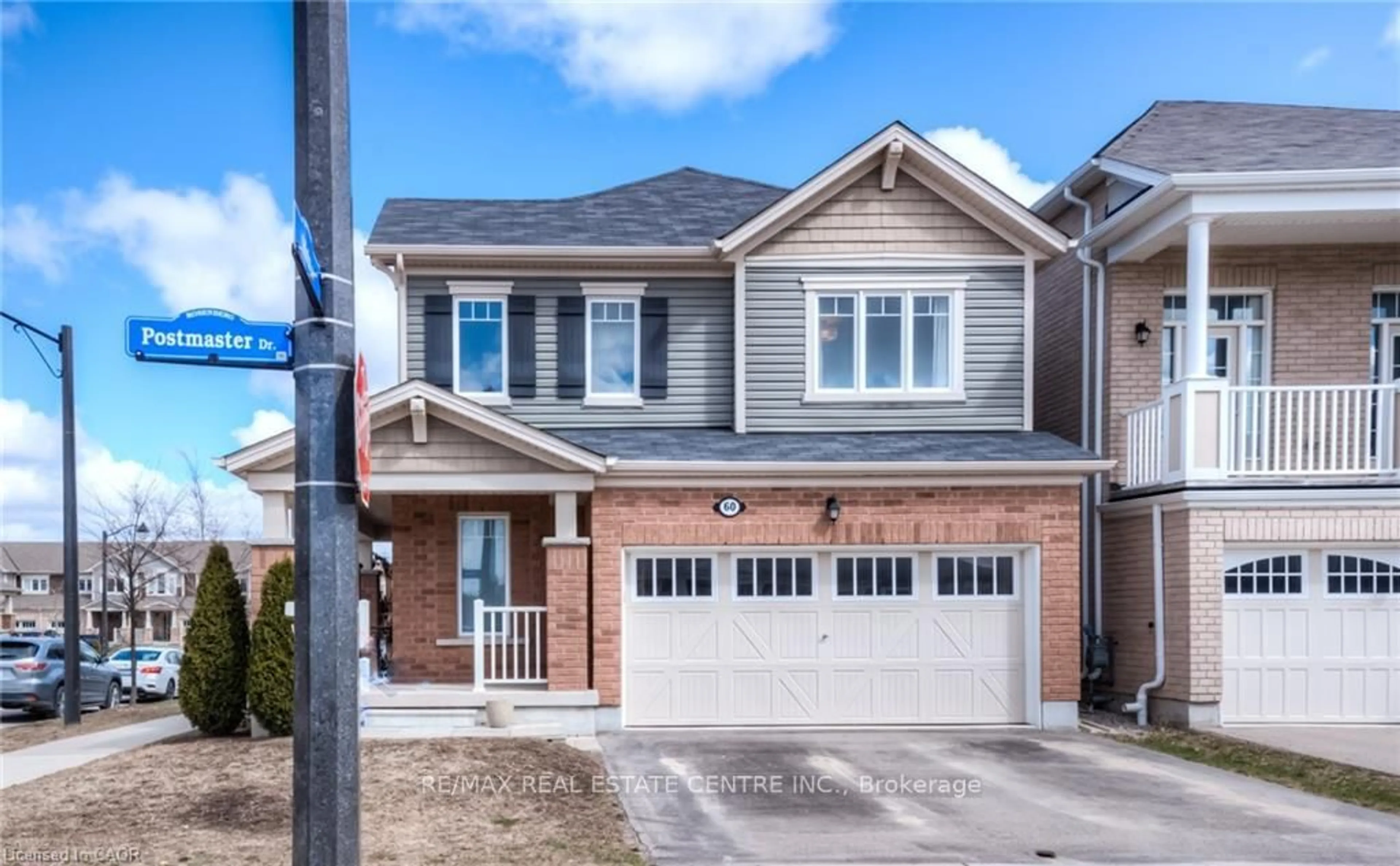 Home with brick exterior material, street for 60 Postmaster Dr, Kitchener Ontario N2R 0J2