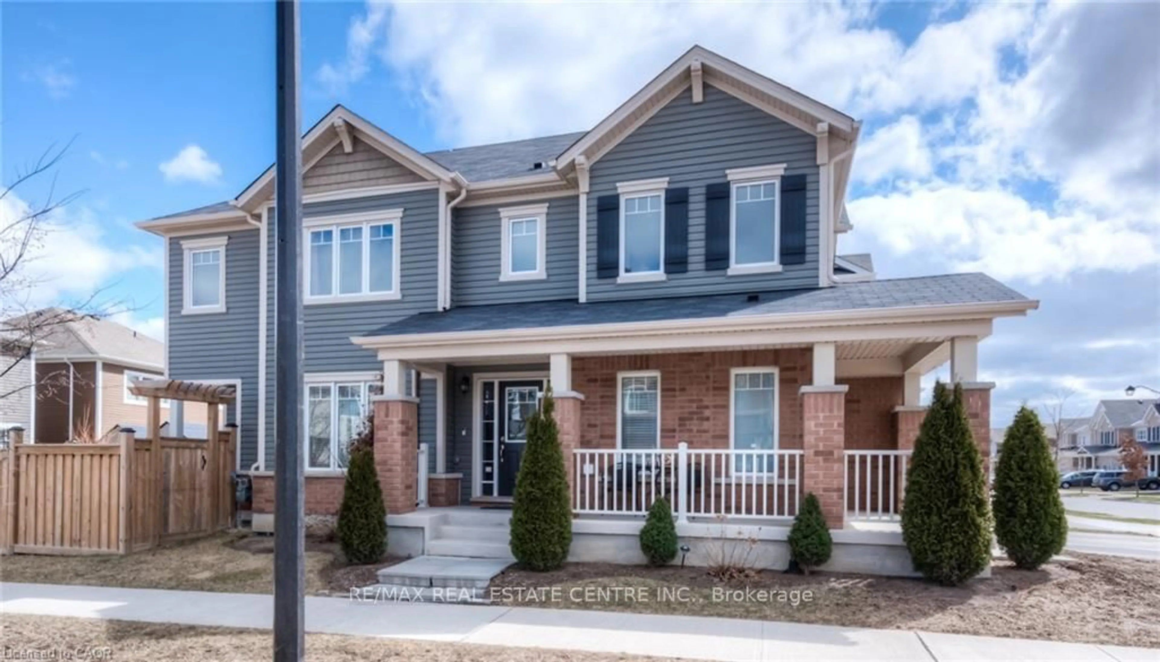 Home with brick exterior material, street for 60 Postmaster Dr, Kitchener Ontario N2R 0J2