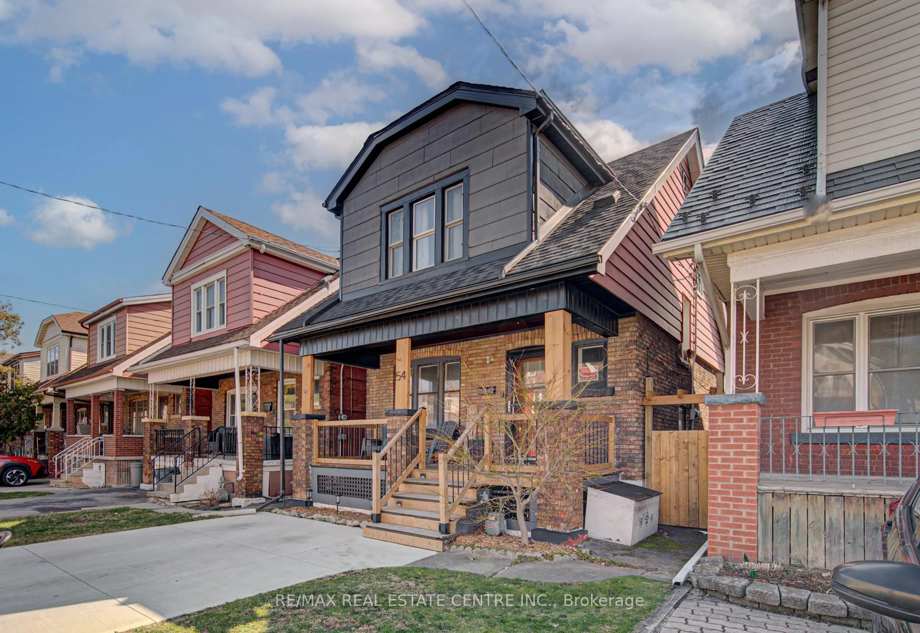 Home with brick exterior material, street for 54 Belmont Ave, Hamilton Ontario L8L 7M1