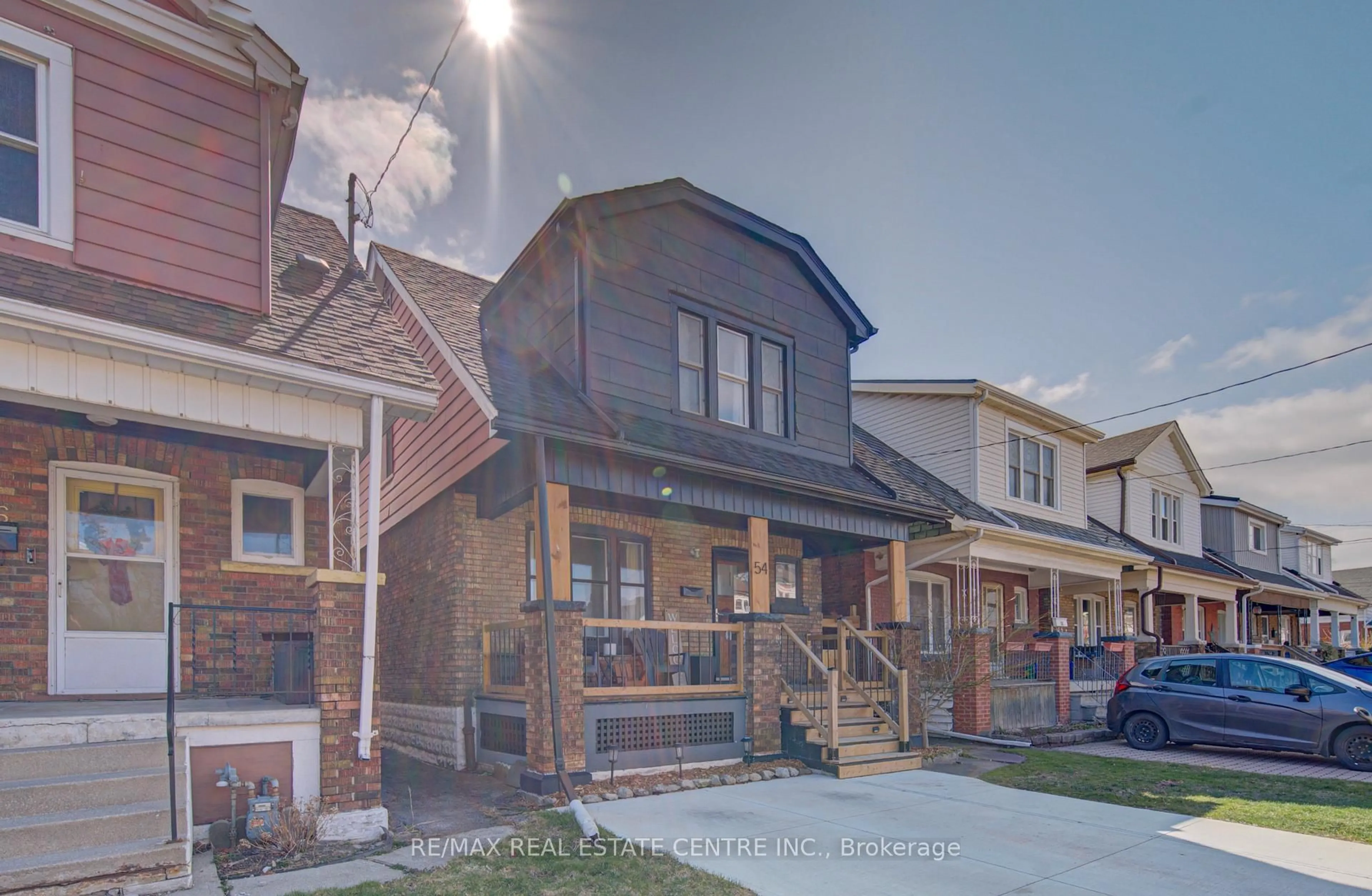 Home with brick exterior material, street for 54 Belmont Ave, Hamilton Ontario L8L 7M1