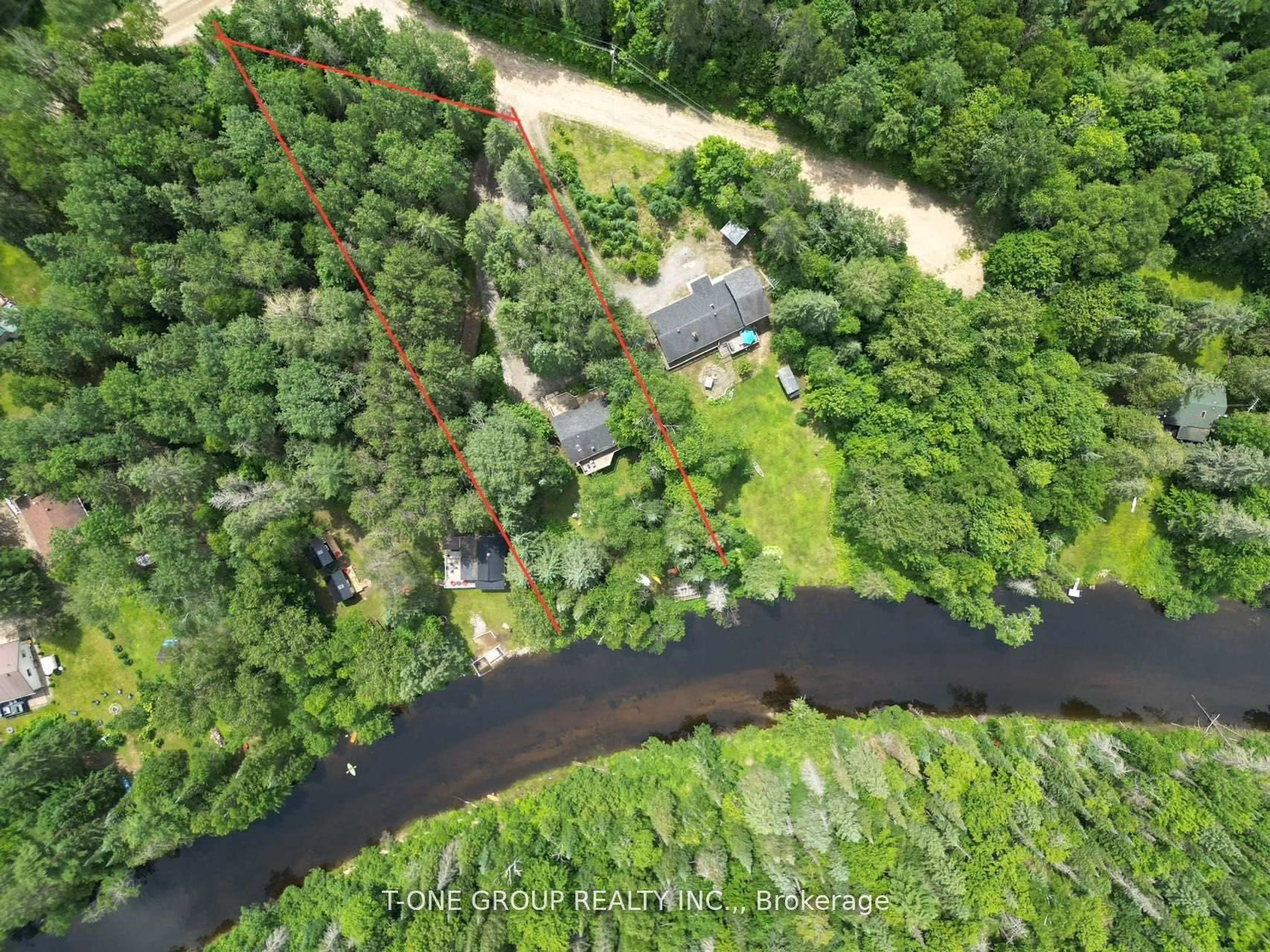 A pic from outside/outdoor area/front of a property/back of a property/a pic from drone, water/lake/river/ocean view for 10 Riverside Crct, Bancroft Ontario K0L 1C0