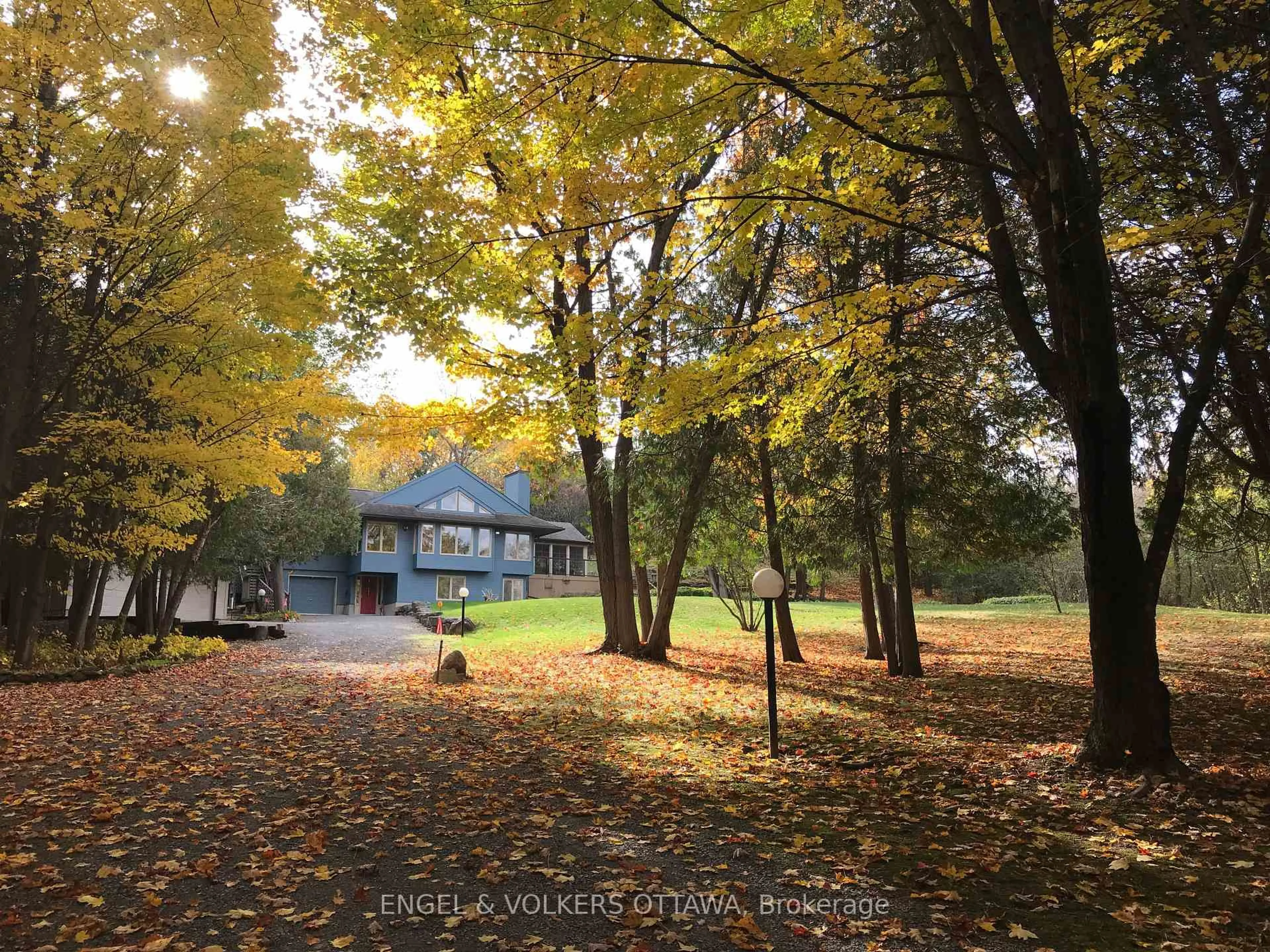 A pic from outside/outdoor area/front of a property/back of a property/a pic from drone, forest/trees view for 4637 Northwoods Dr, Ottawa Ontario K0A 3M0