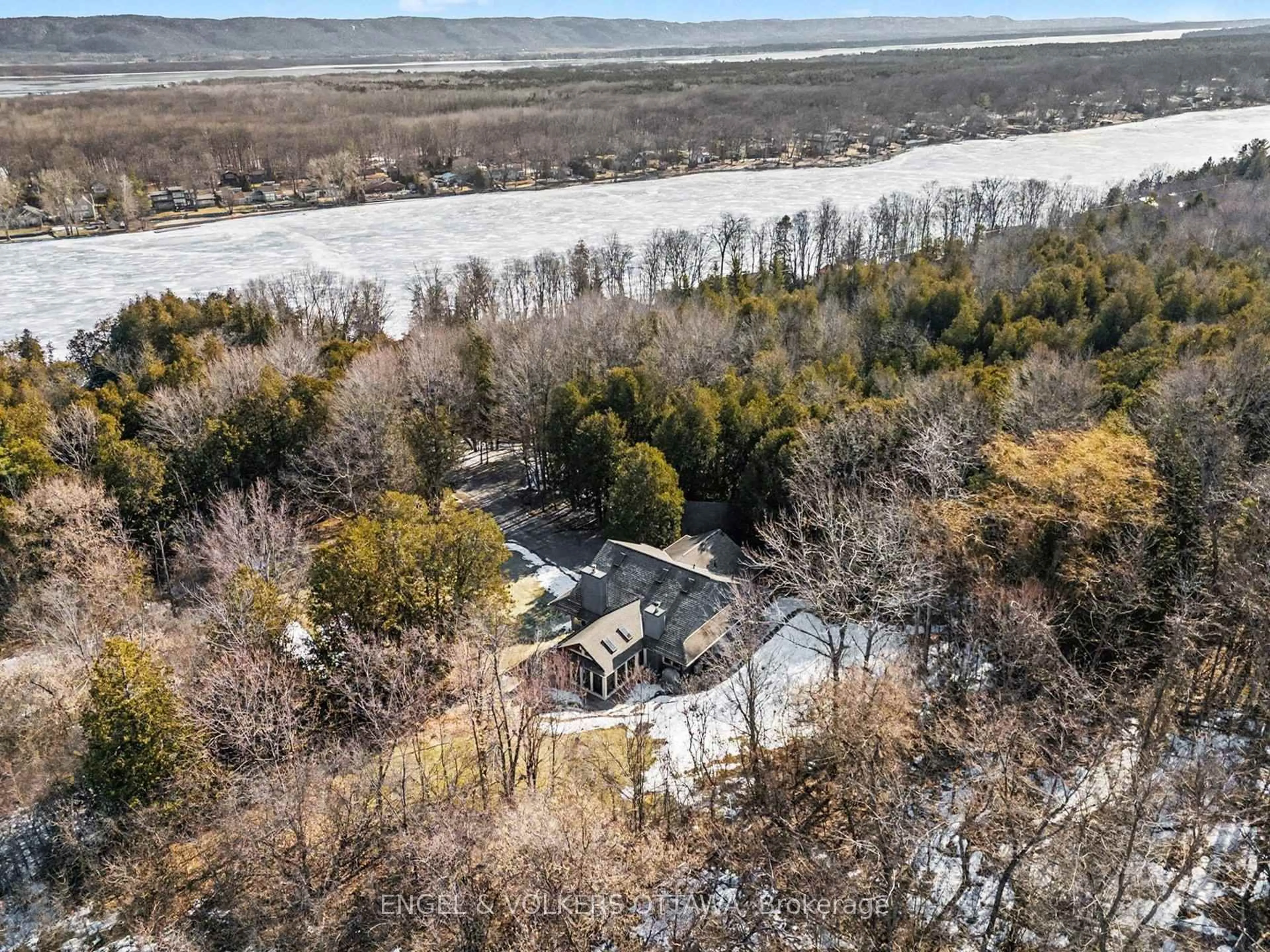 A pic from outside/outdoor area/front of a property/back of a property/a pic from drone, water/lake/river/ocean view for 4637 Northwoods Dr, Ottawa Ontario K0A 3M0