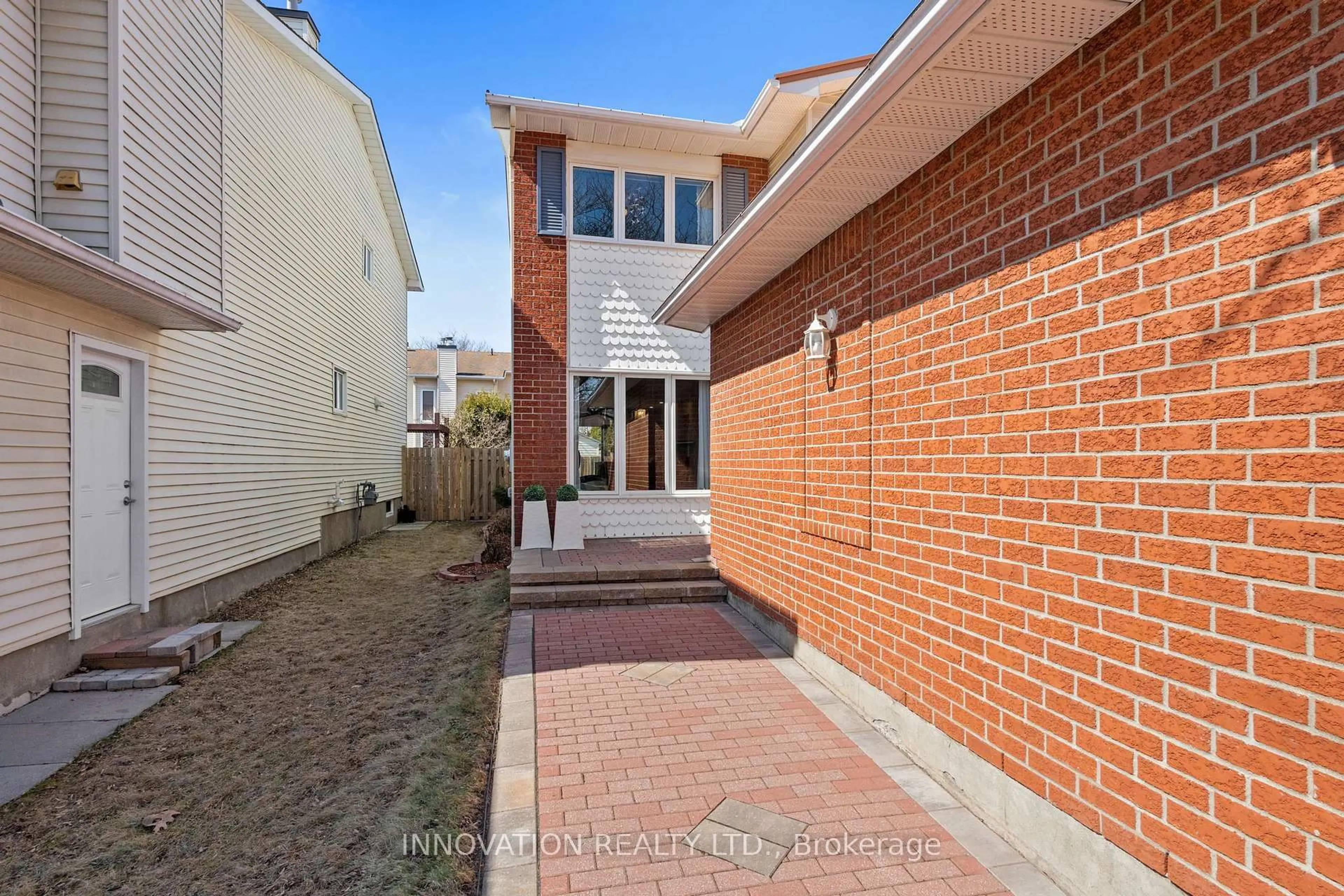 Home with brick exterior material, street for 2056 Wildflower Dr, Orleans Ontario K1E 3R3