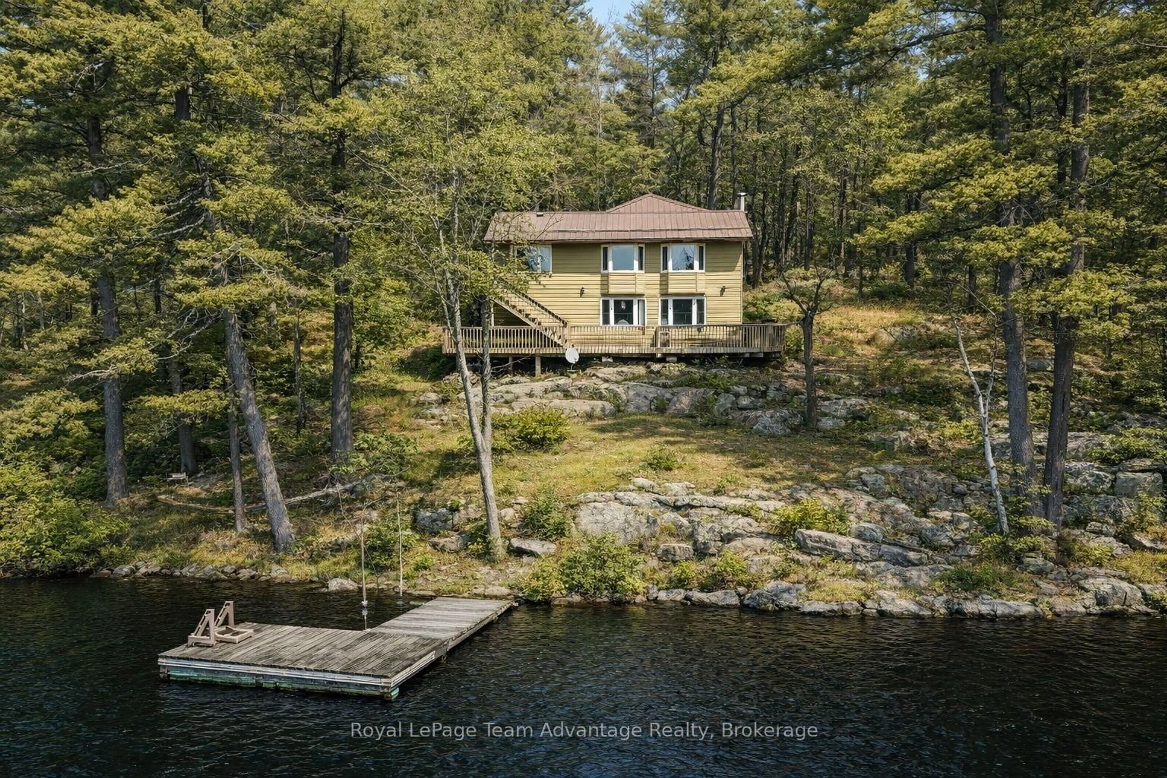 A pic from outside/outdoor area/front of a property/back of a property/a pic from drone, water/lake/river/ocean view for 39 Wood Duck Tr, The Archipelago Ontario P0G 1K0