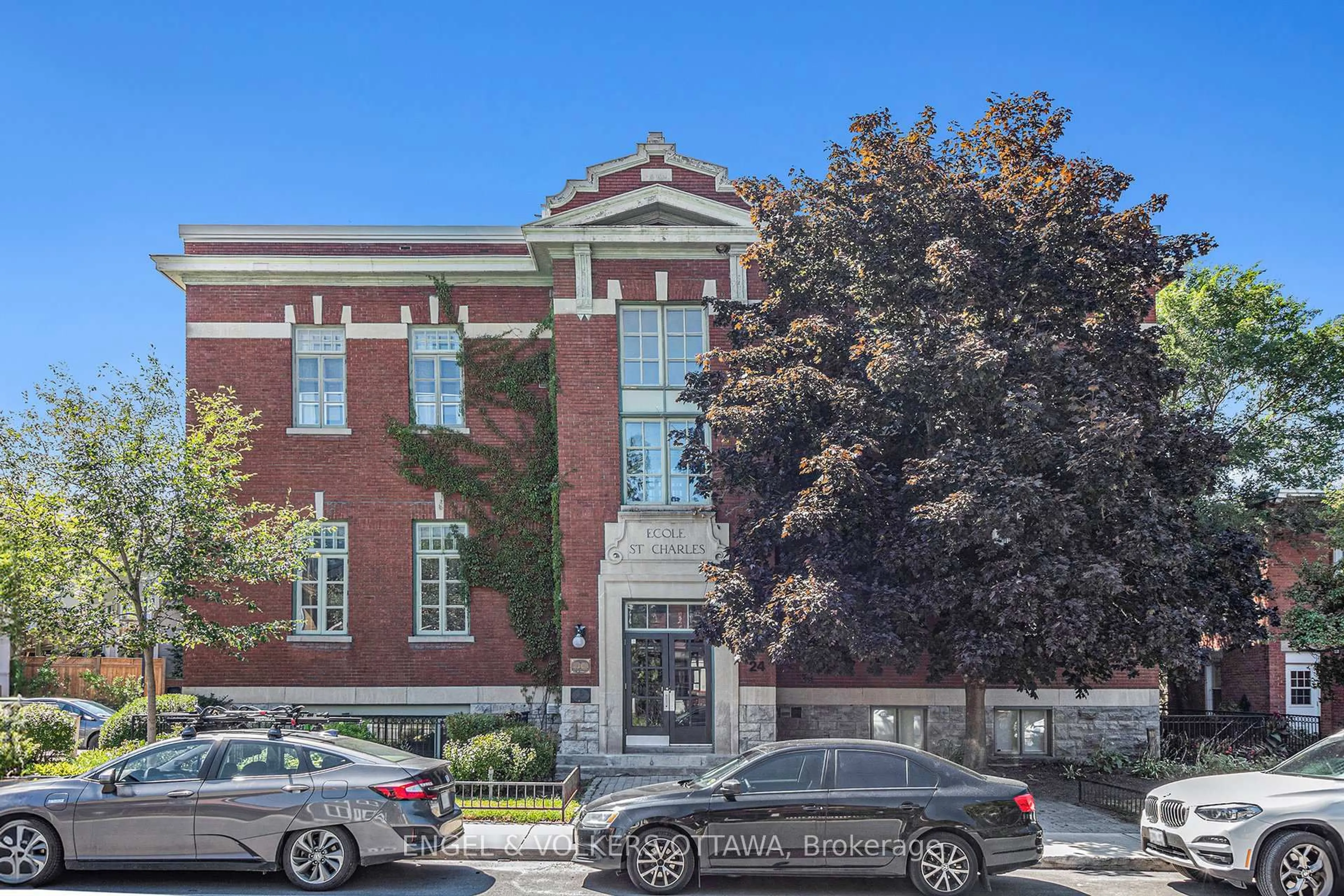 Home with brick exterior material, street for 24 Springfield Rd #203, Ottawa Ontario K1M 1C9