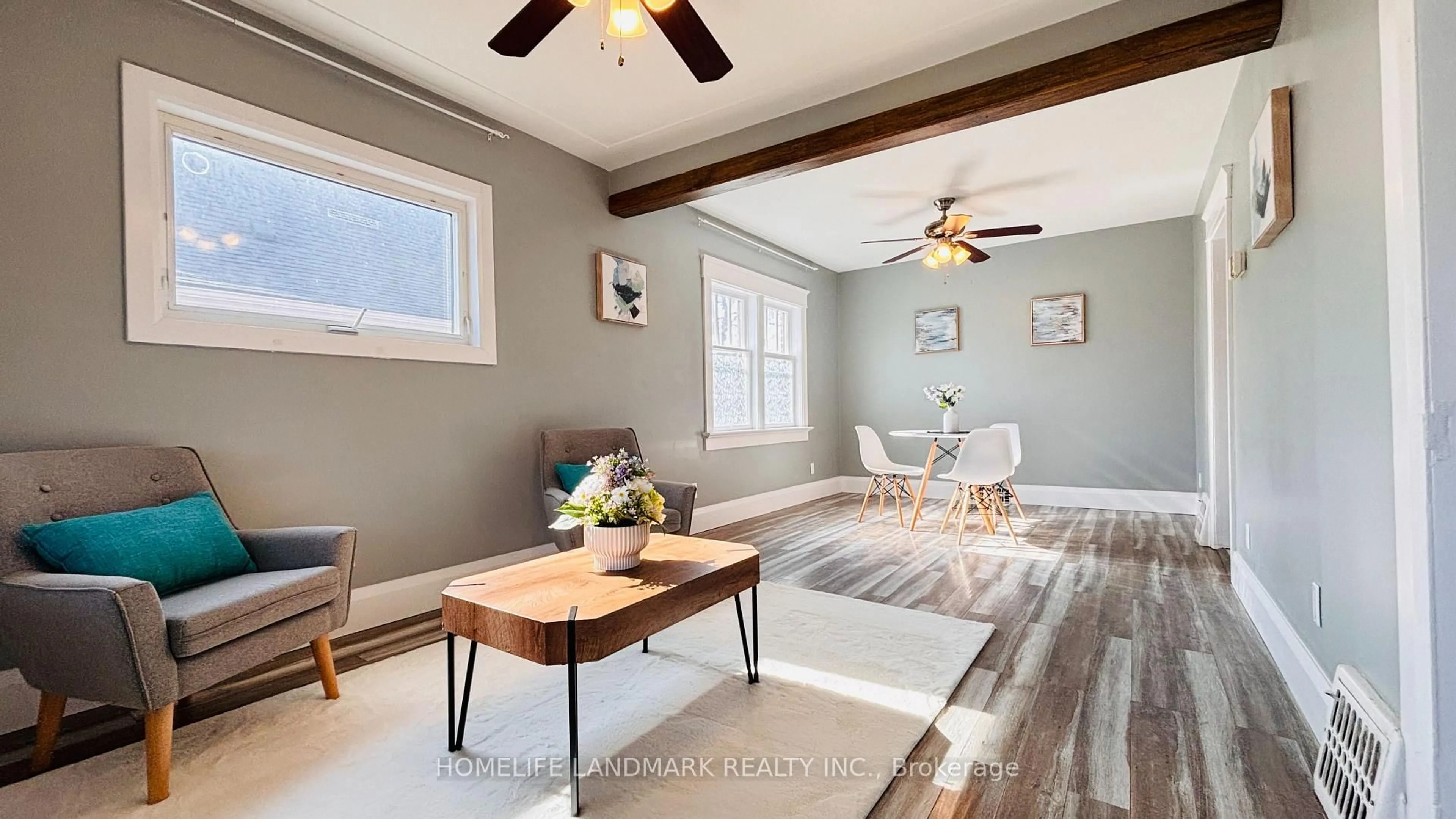 Living room with furniture, wood/laminate floor for 138 GLASGOW St, Kitchener Ontario N2G 2G9