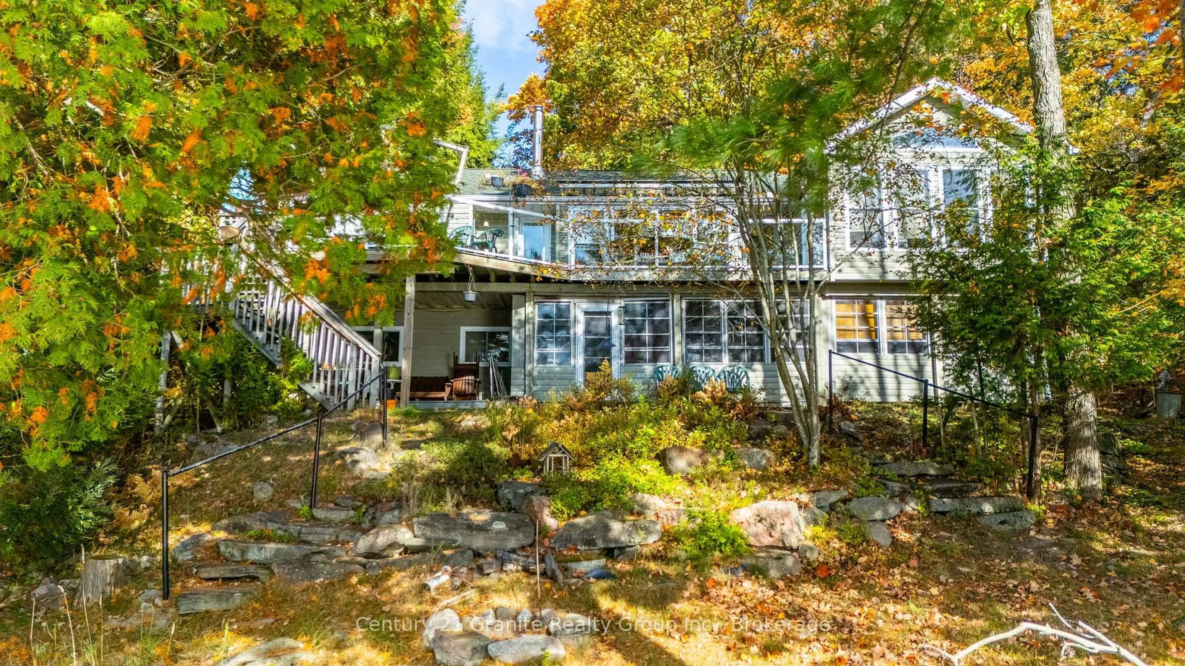 A pic from outside/outdoor area/front of a property/back of a property/a pic from drone, water/lake/river/ocean view for 1058 Kipps Lane, Dysart et al Ontario K0M 1S0