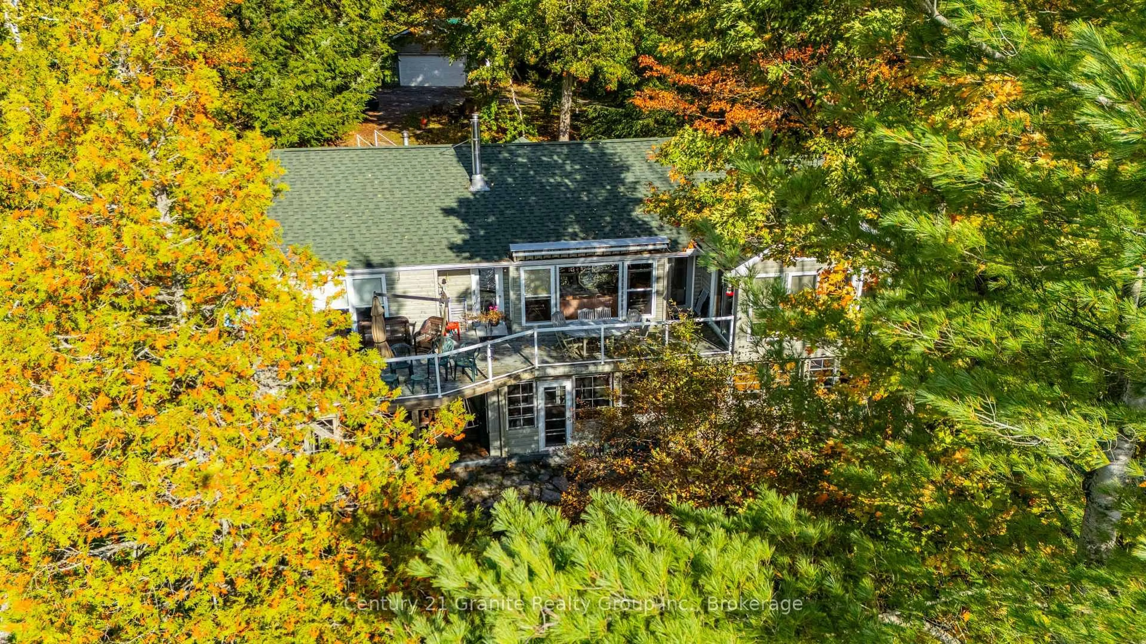 A pic from outside/outdoor area/front of a property/back of a property/a pic from drone, water/lake/river/ocean view for 1058 Kipps Lane, Dysart et al Ontario K0M 1S0