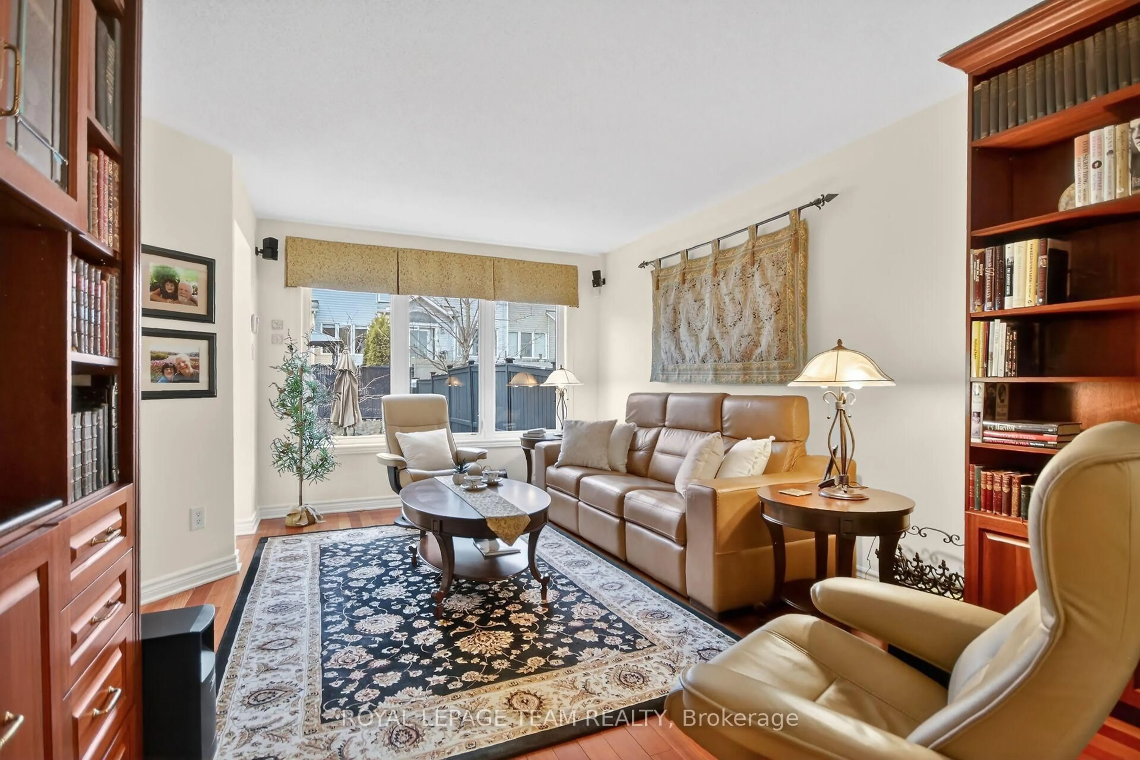 Living room with furniture, carpet floor for 210 Hunterbrook St, Kanata Ontario K2K 0E6