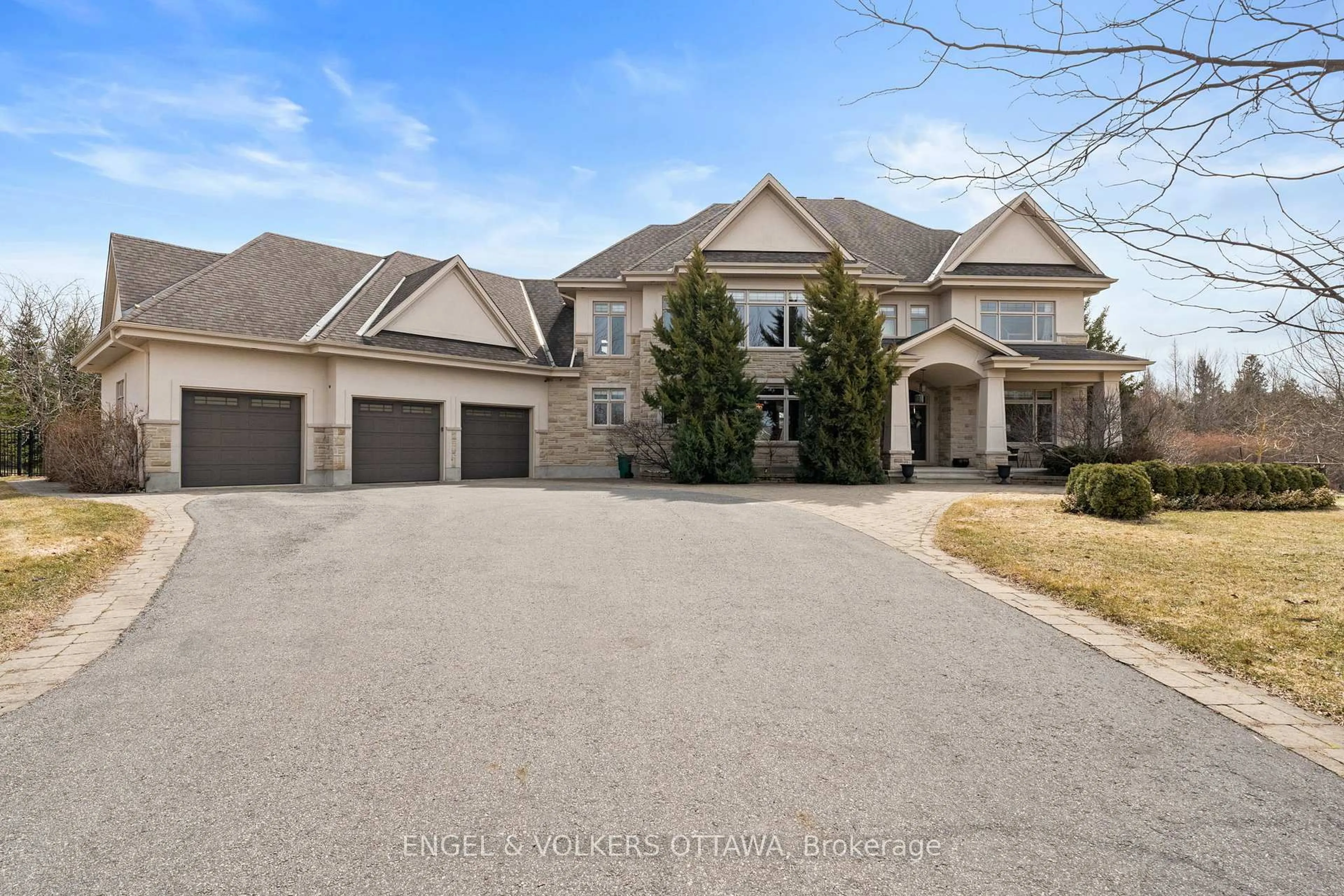Home with brick exterior material, street for 5796 Longhearth Way, Manotick Ontario K4M 1M1