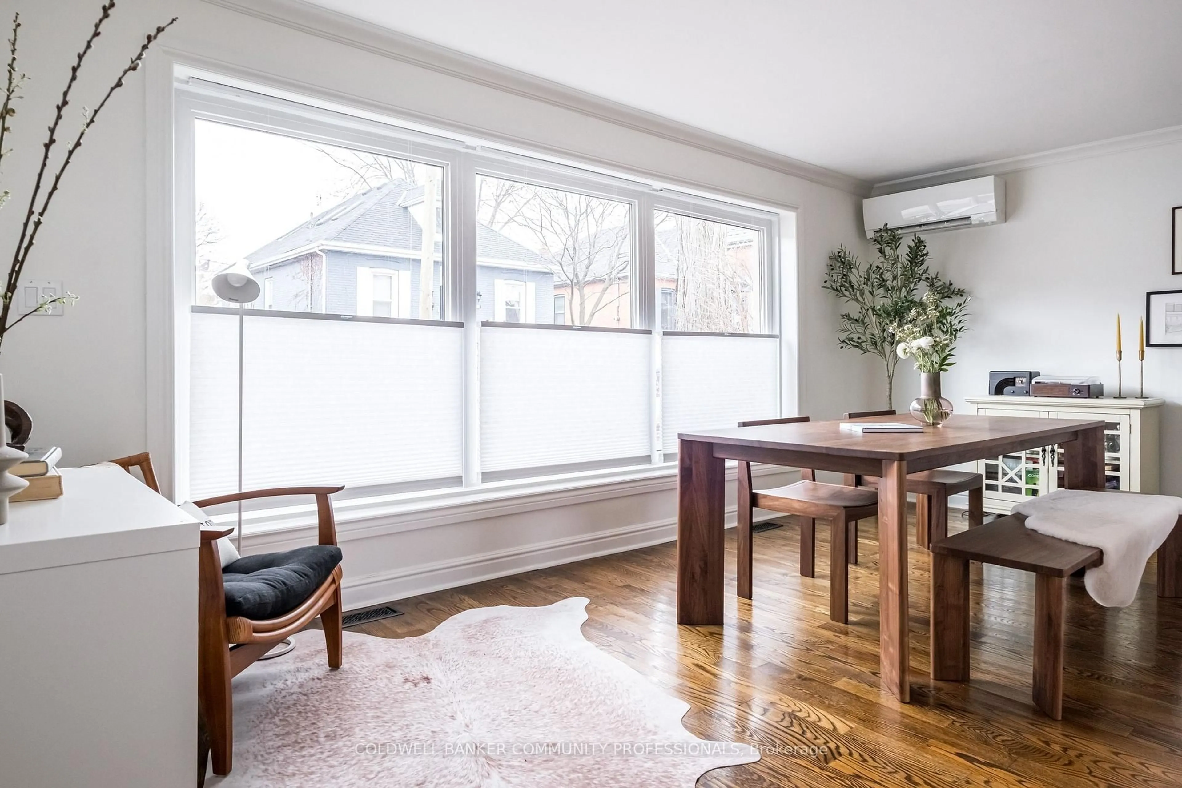 Dining room, wood/laminate floor for 14 Reginald St, Hamilton Ontario L8P 3X9