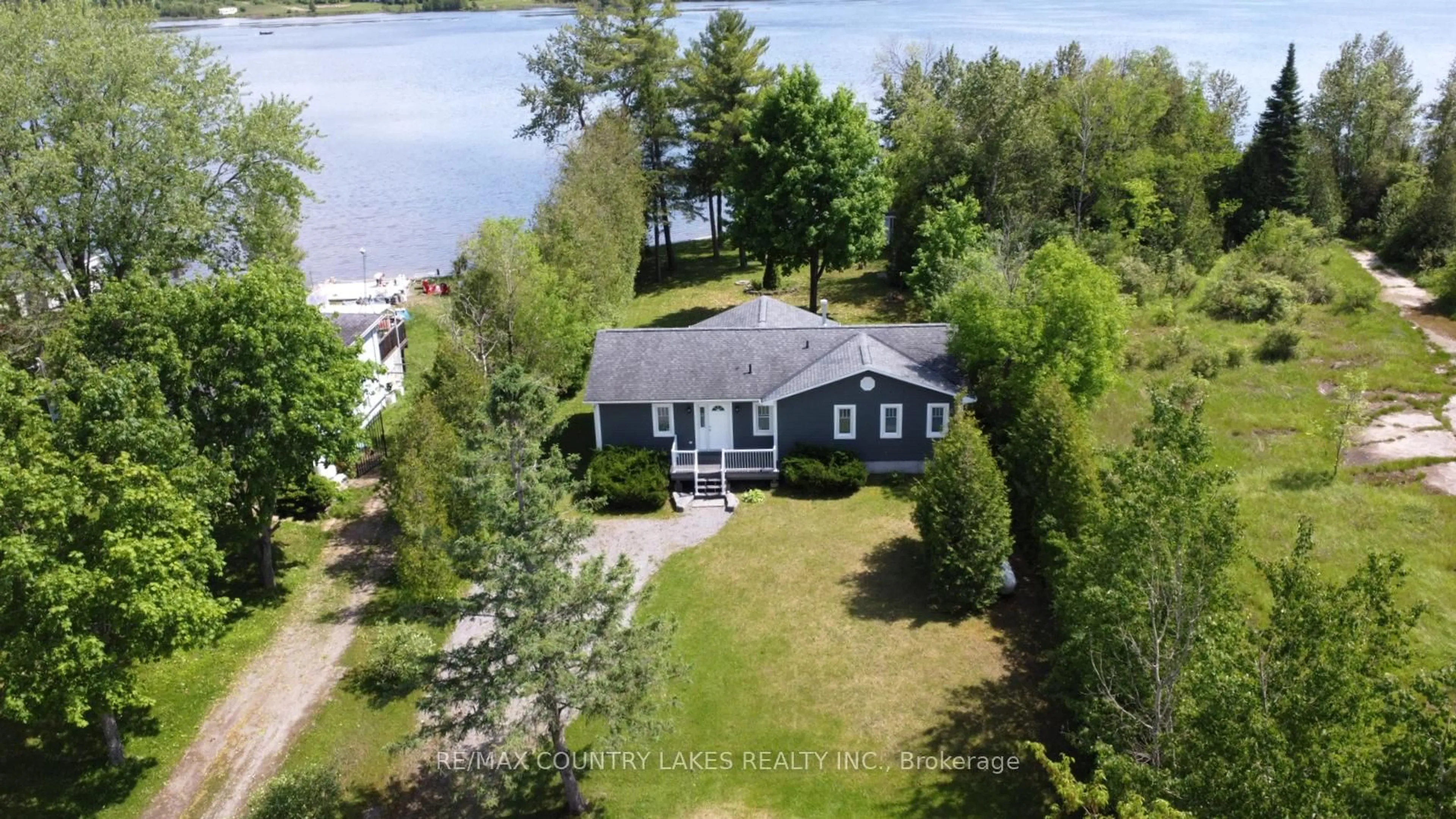 A pic from outside/outdoor area/front of a property/back of a property/a pic from drone, water/lake/river/ocean view for 275 McGuire Beach Rd, Kawartha Lakes Ontario K0M 2B0