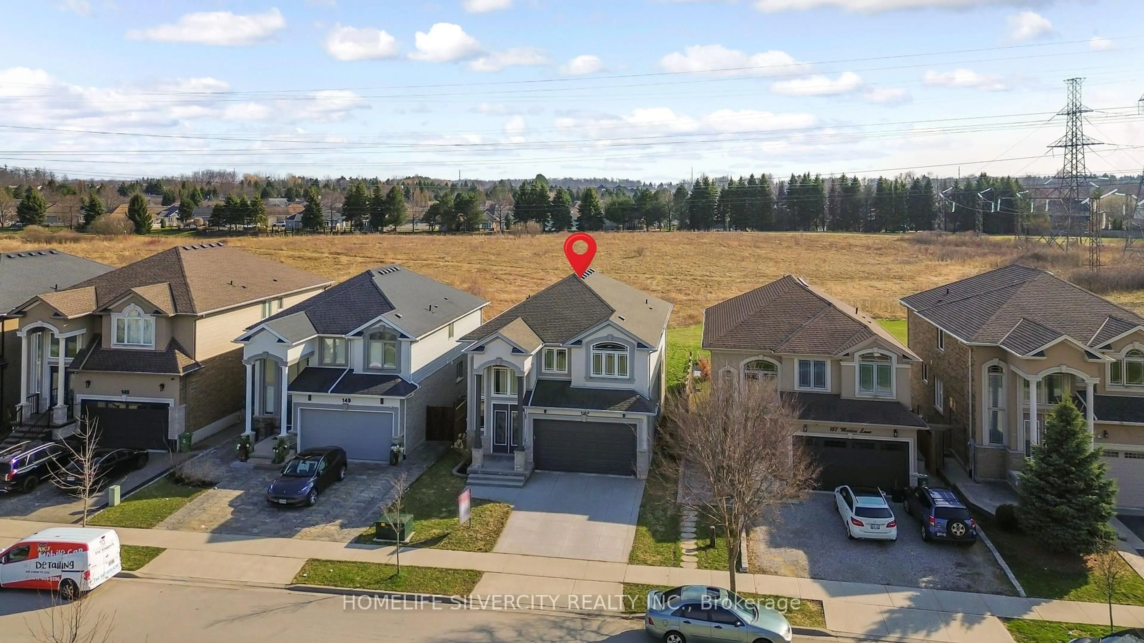 A pic from outside/outdoor area/front of a property/back of a property/a pic from drone, unknown for 153 Medici Lane, Hamilton Ontario L9B 0G7