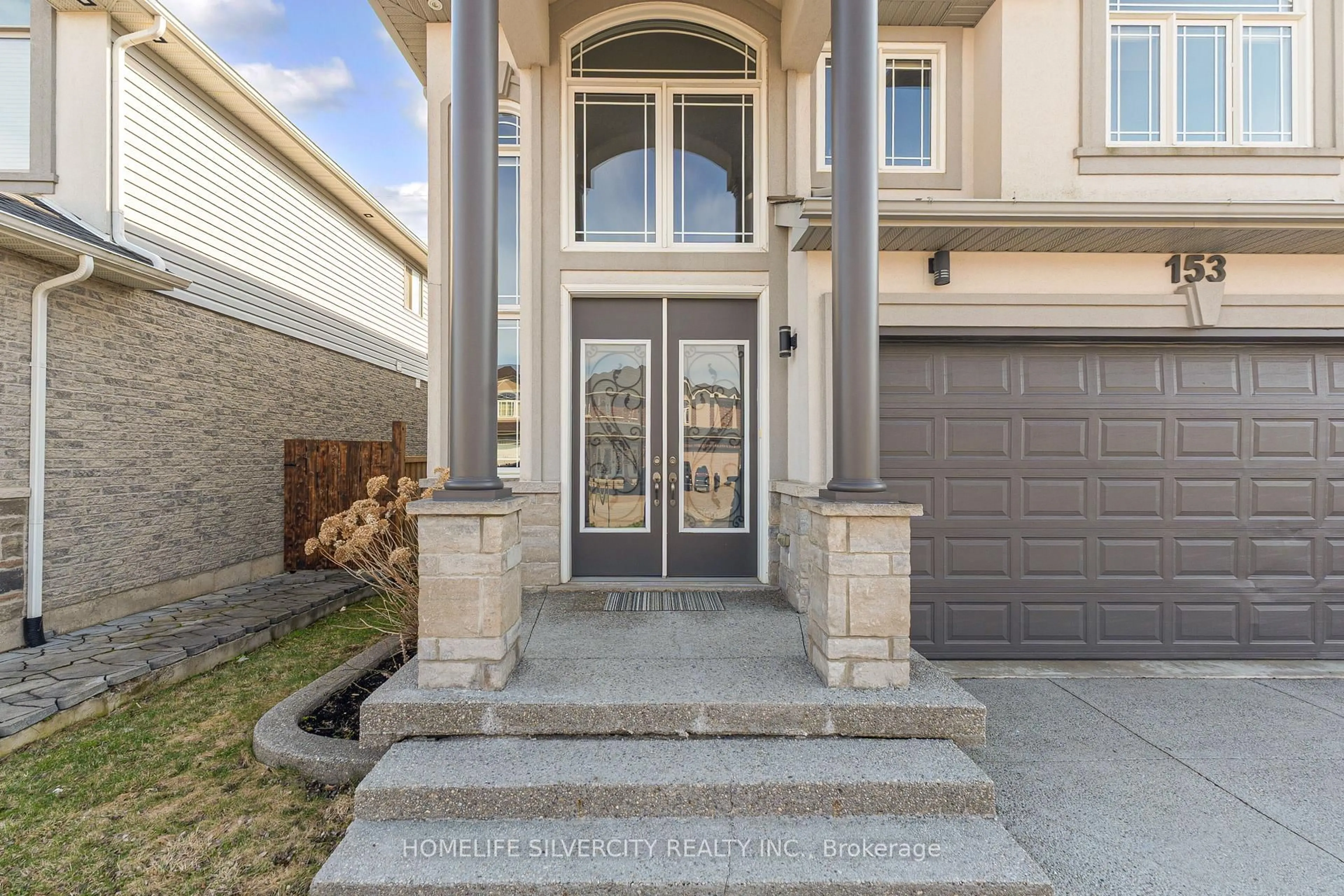 Home with brick exterior material, street for 153 Medici Lane, Hamilton Ontario L9B 0G7