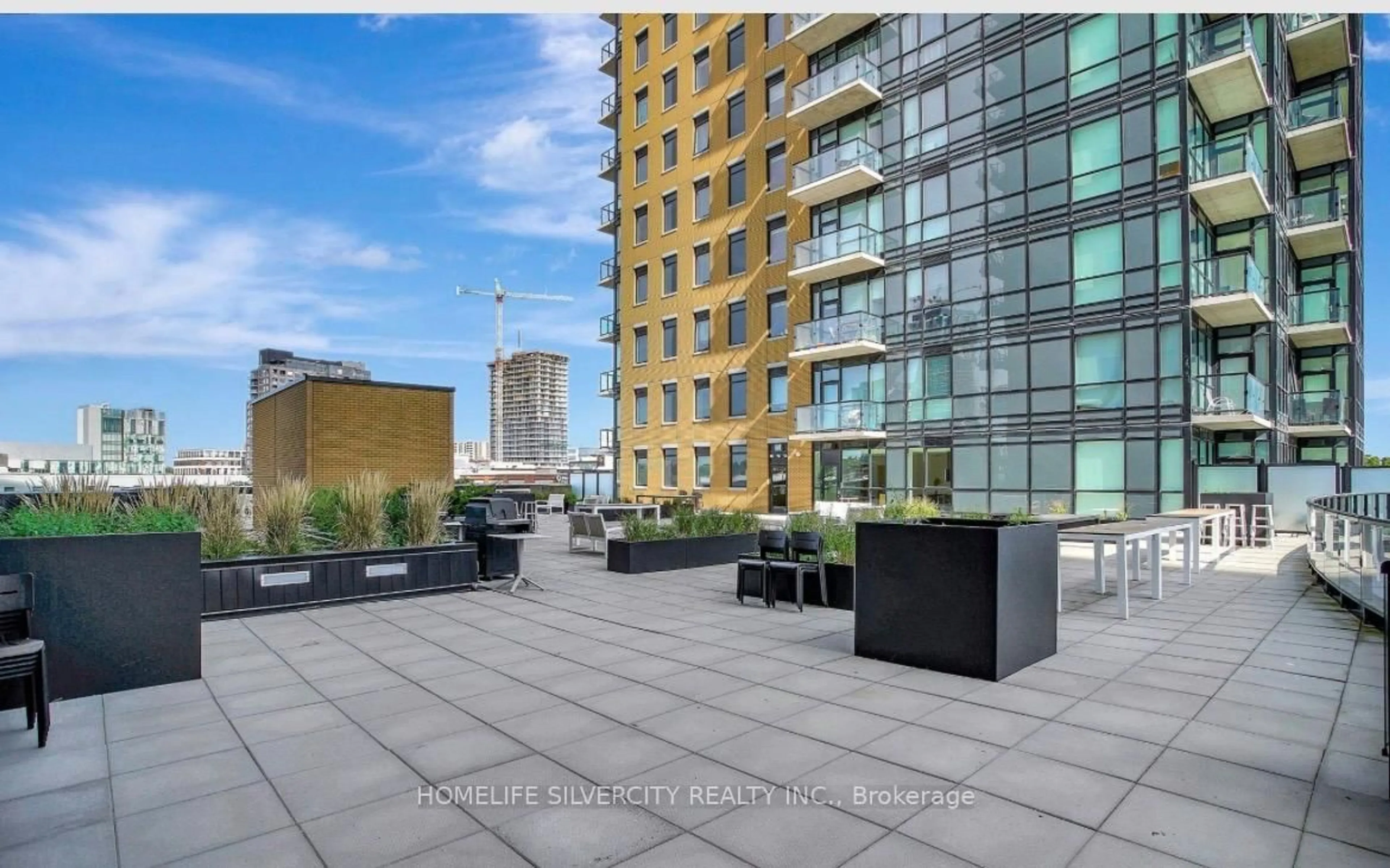 Patio, city buildings view from balcony for 104 Garment St #1003, Kitchener Ontario N2G 0C8