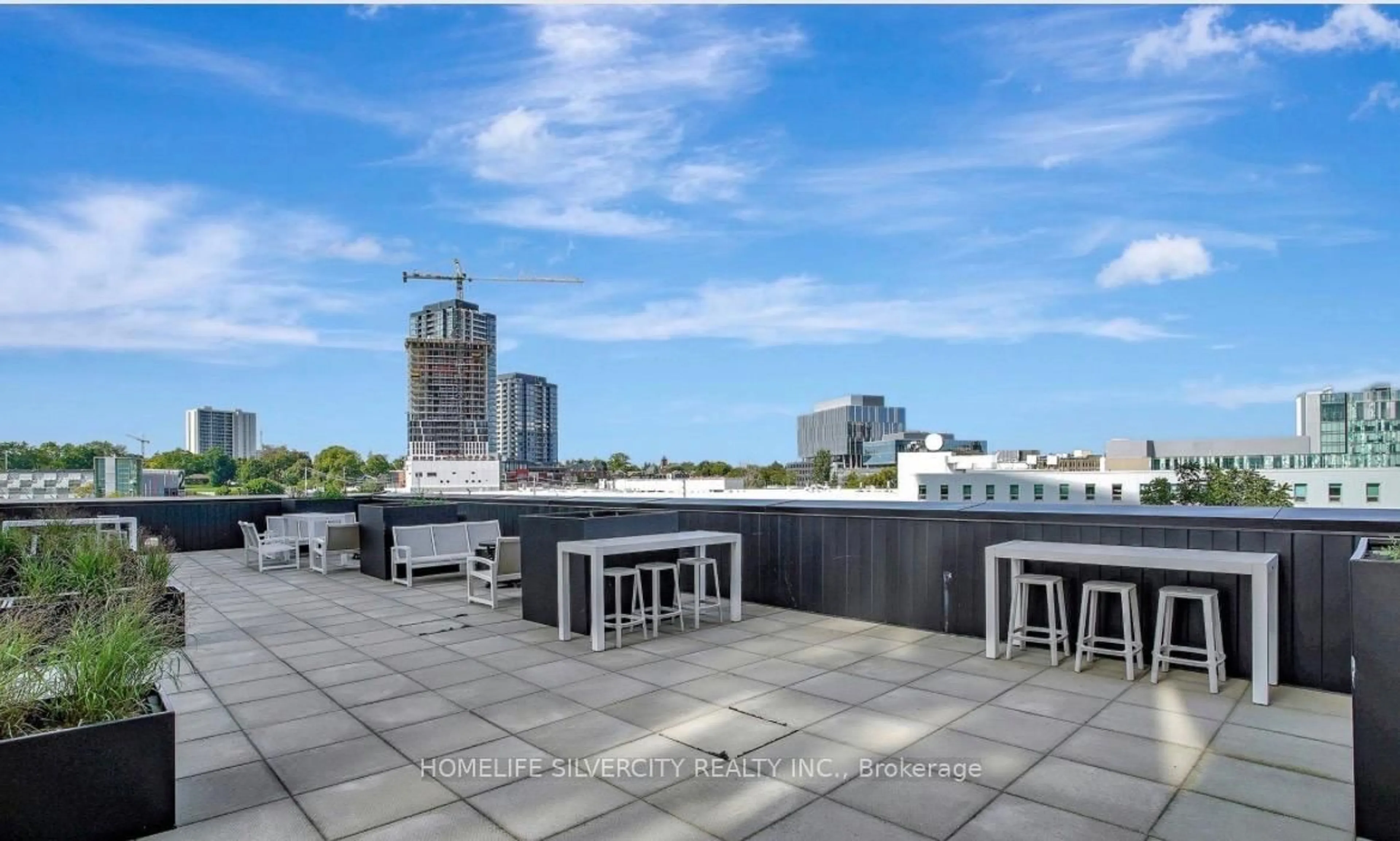 Patio, city buildings view from balcony for 104 Garment St #1003, Kitchener Ontario N2G 0C8