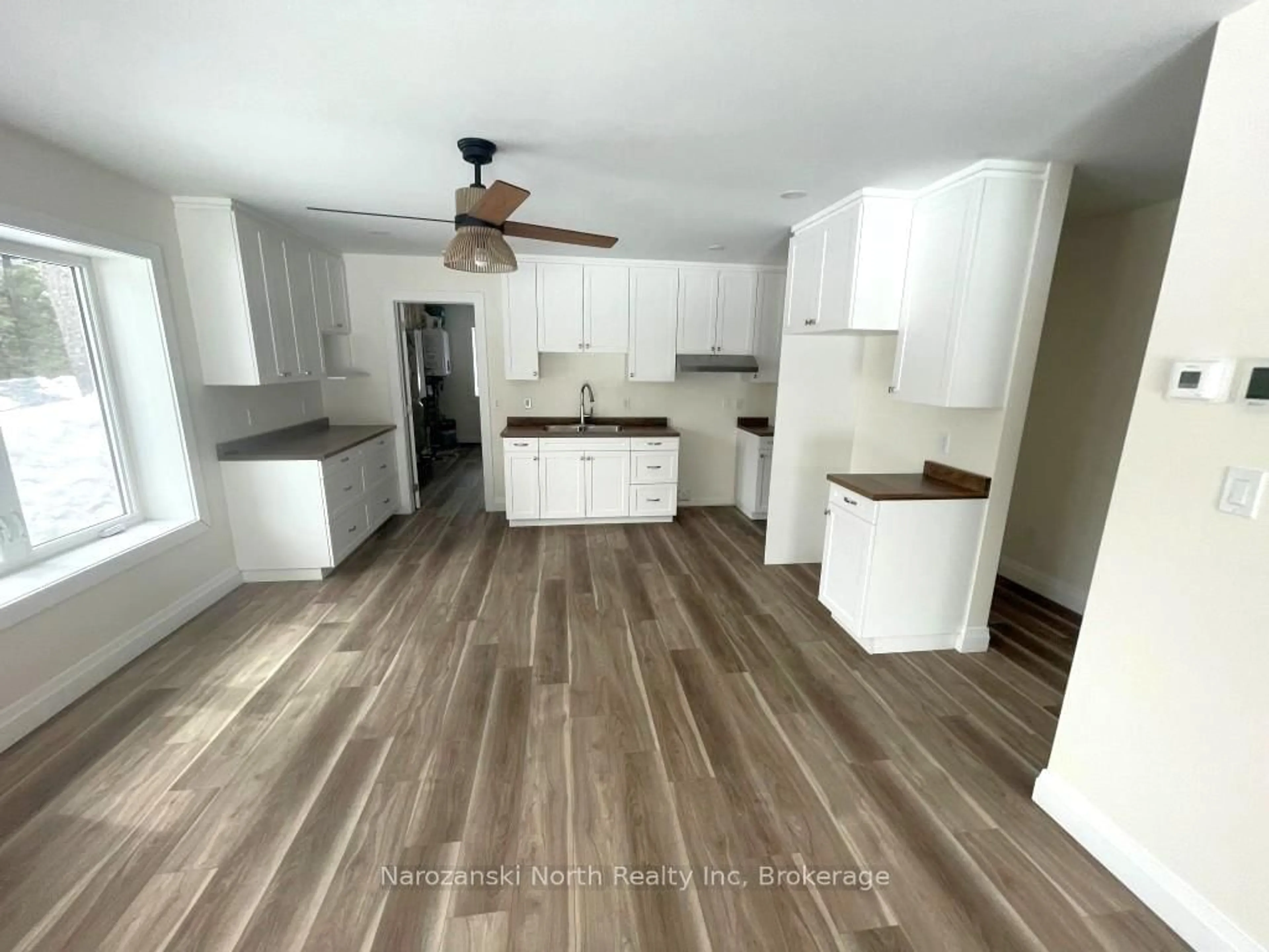 Open concept kitchen, wood/laminate floor for 79 Leduc Rd, West Nipissing Ontario P0H 1M0