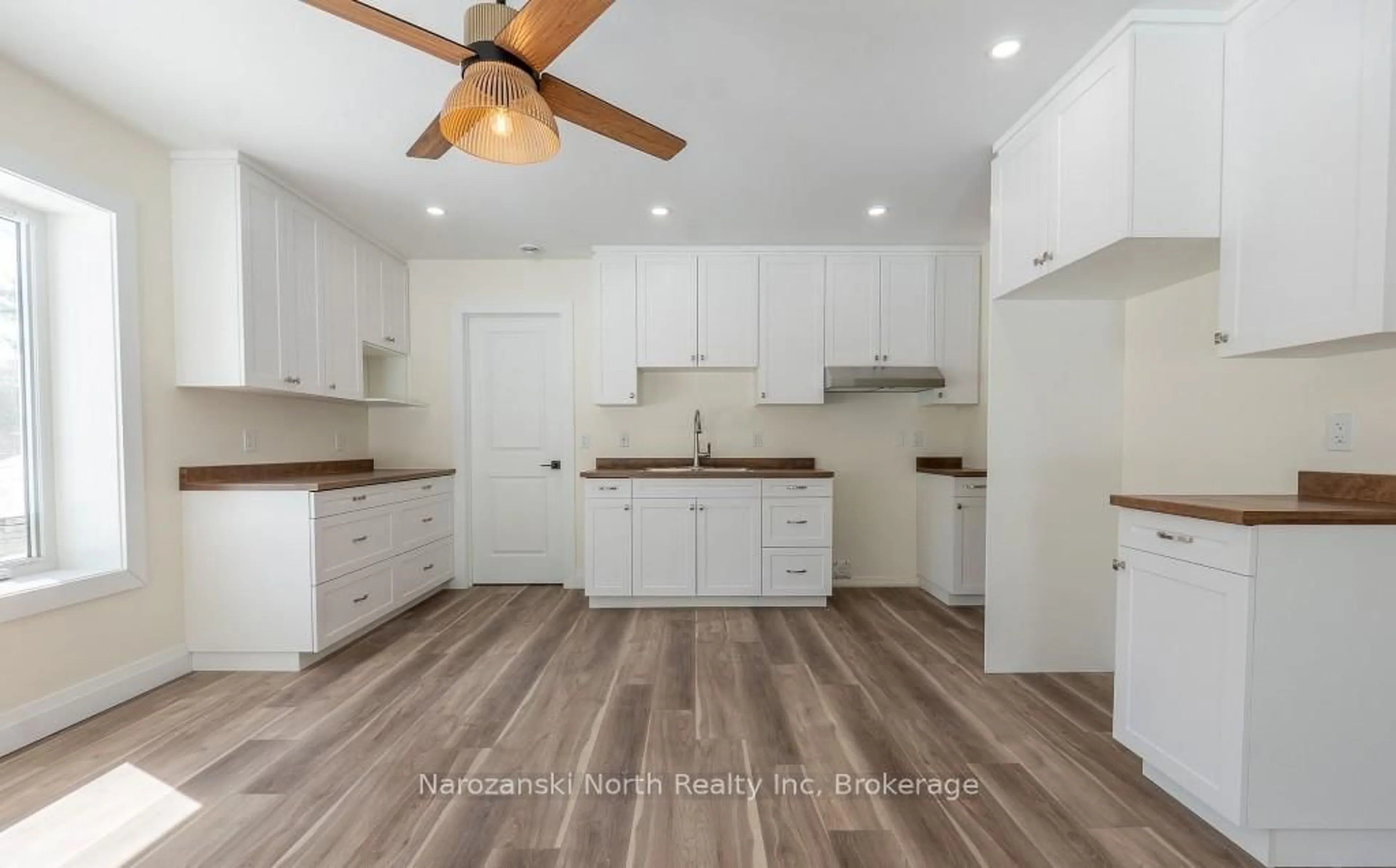 Open concept kitchen, wood/laminate floor for 79 Leduc Rd, West Nipissing Ontario P0H 1M0