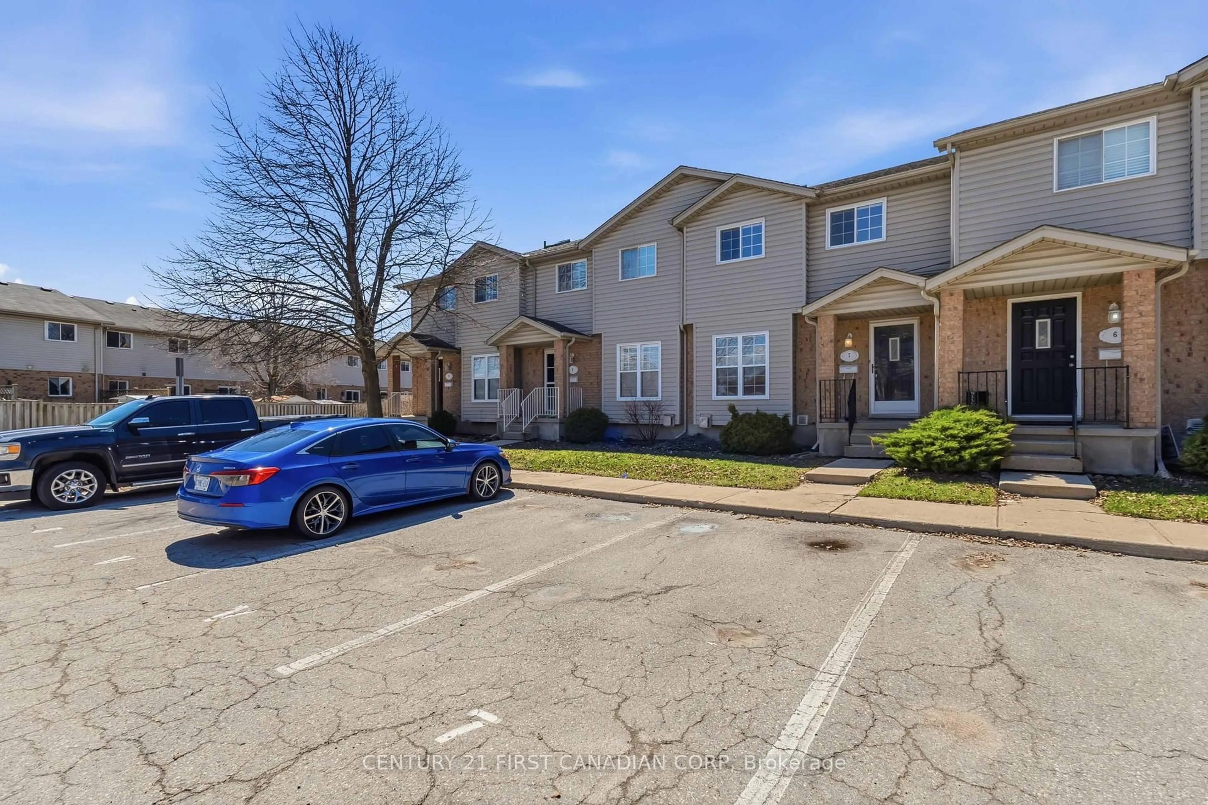 A pic from outside/outdoor area/front of a property/back of a property/a pic from drone, street for 1920 MARCONI Blvd #7, London East Ontario N5V 4X8