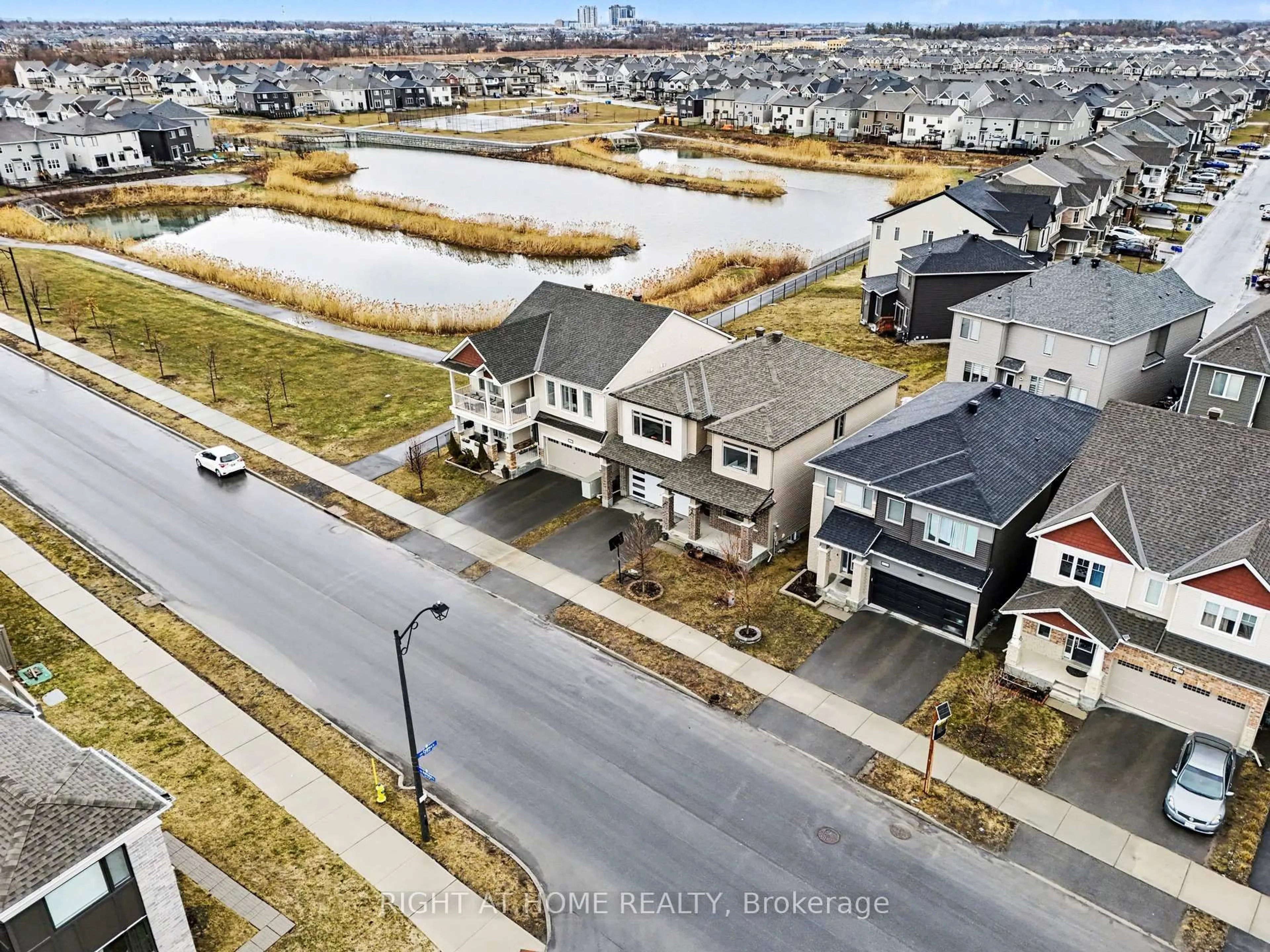 A pic from outside/outdoor area/front of a property/back of a property/a pic from drone, water/lake/river/ocean view for 1089 Apolune St, Ottawa Ontario K2J 6N8