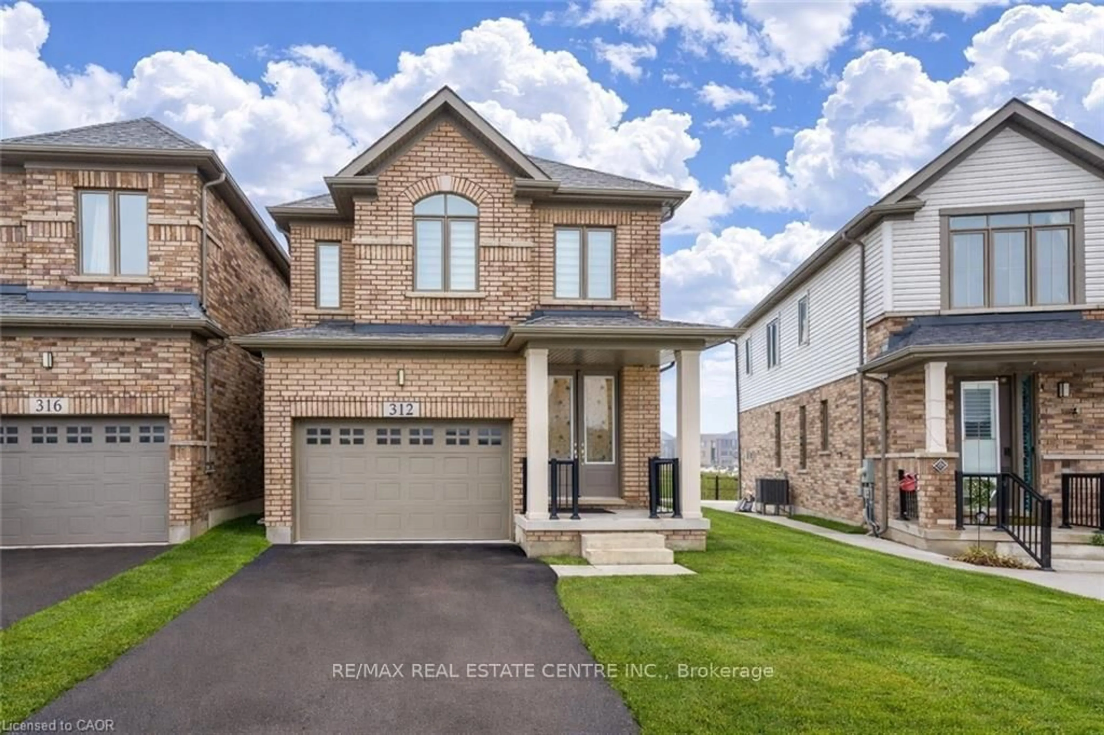 Home with brick exterior material, street for 312 Bismark Dr, Cambridge Ontario N1S 0C6