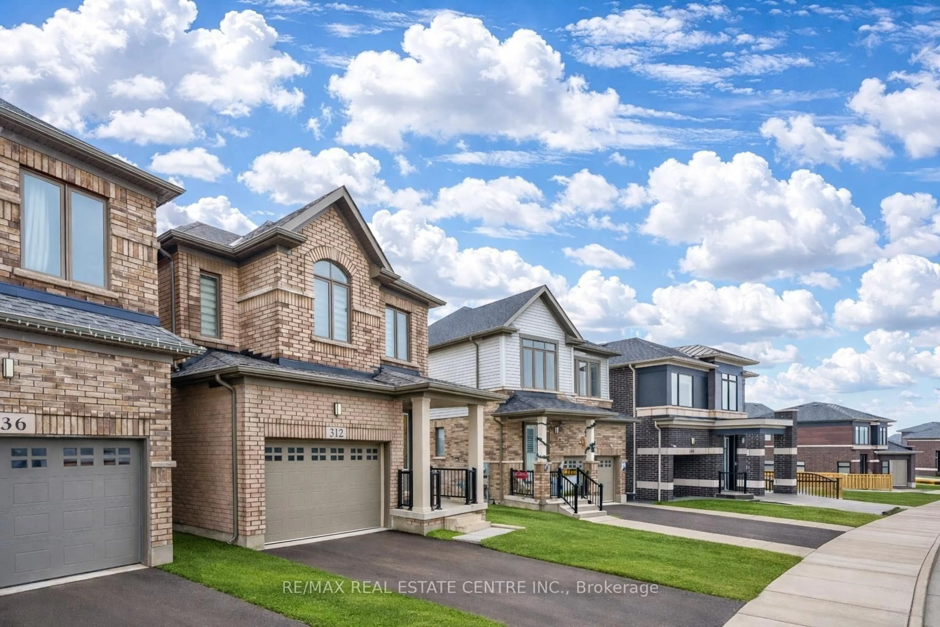 Home with brick exterior material, street for 312 Bismark Dr, Cambridge Ontario N1S 0C6