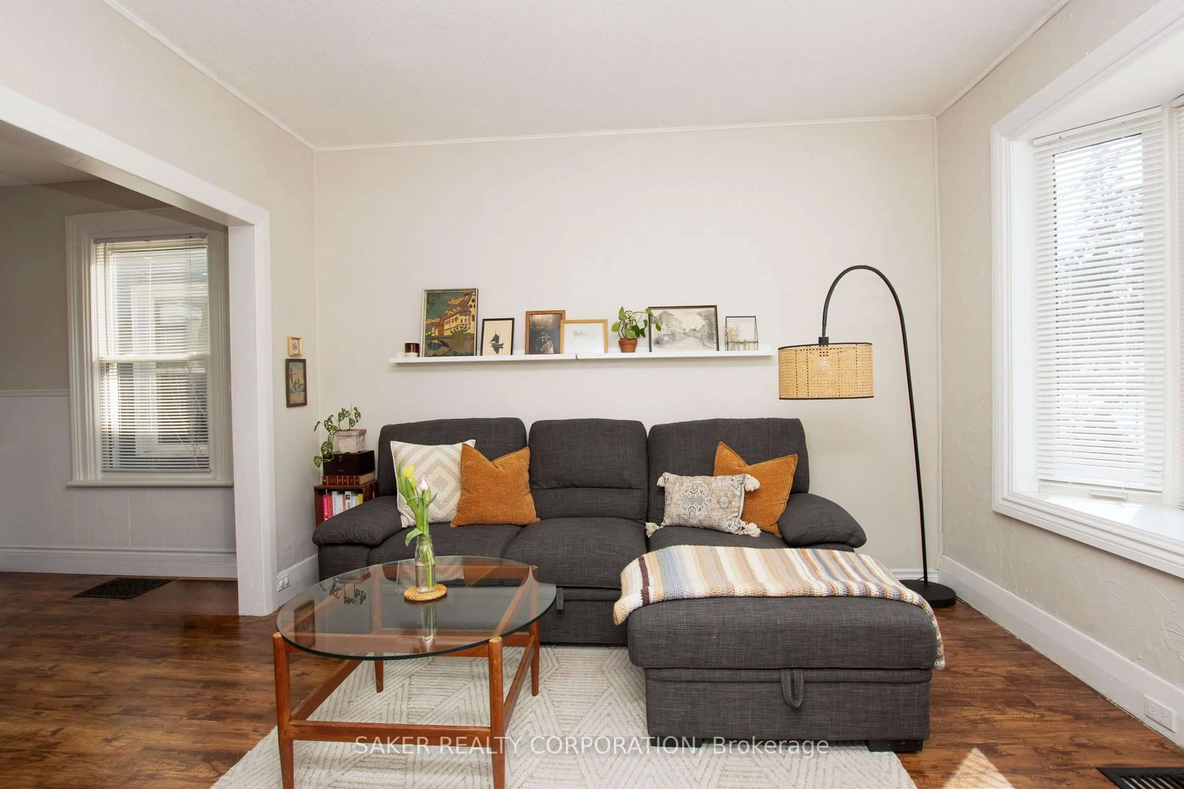 Living room with furniture, wood/laminate floor for 688 William St, London East Ontario N5Y 2R2