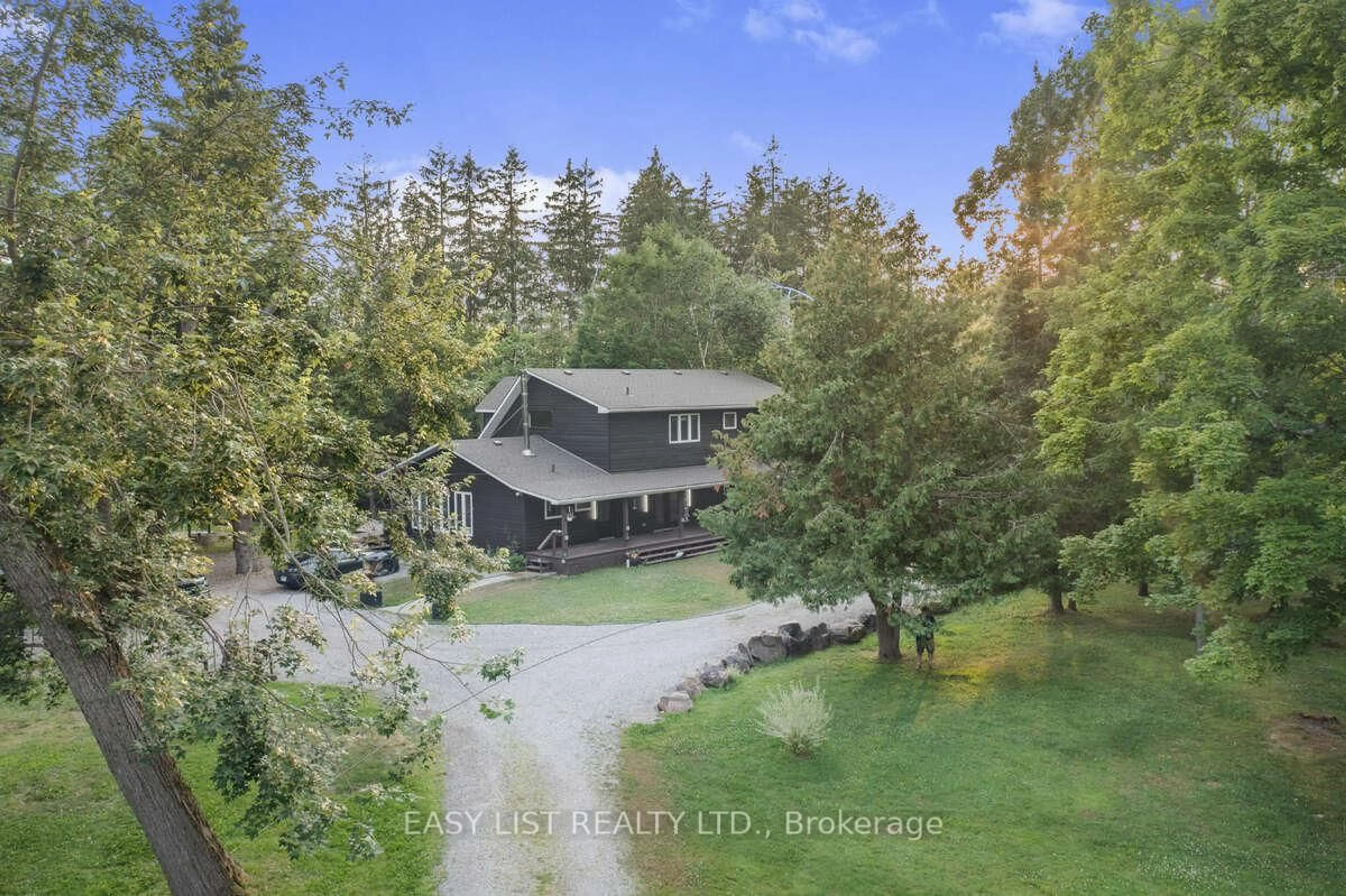 A pic from outside/outdoor area/front of a property/back of a property/a pic from drone, unknown for 64 Fire Route 96, Trent Lakes Ontario K0M 1A0