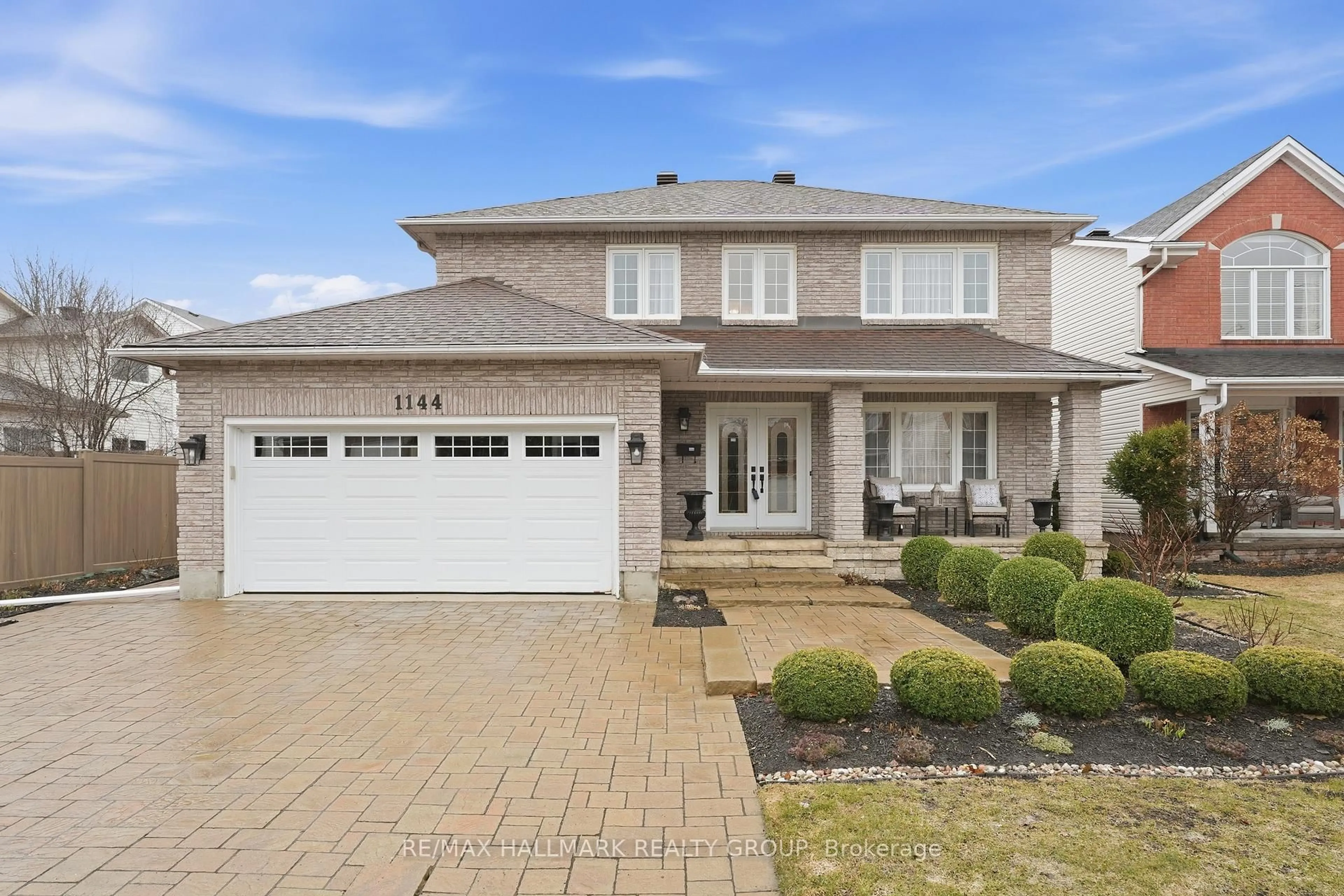 Home with vinyl exterior material, street for 1144 Ambercrest St, Ottawa Ontario K1J 1A9