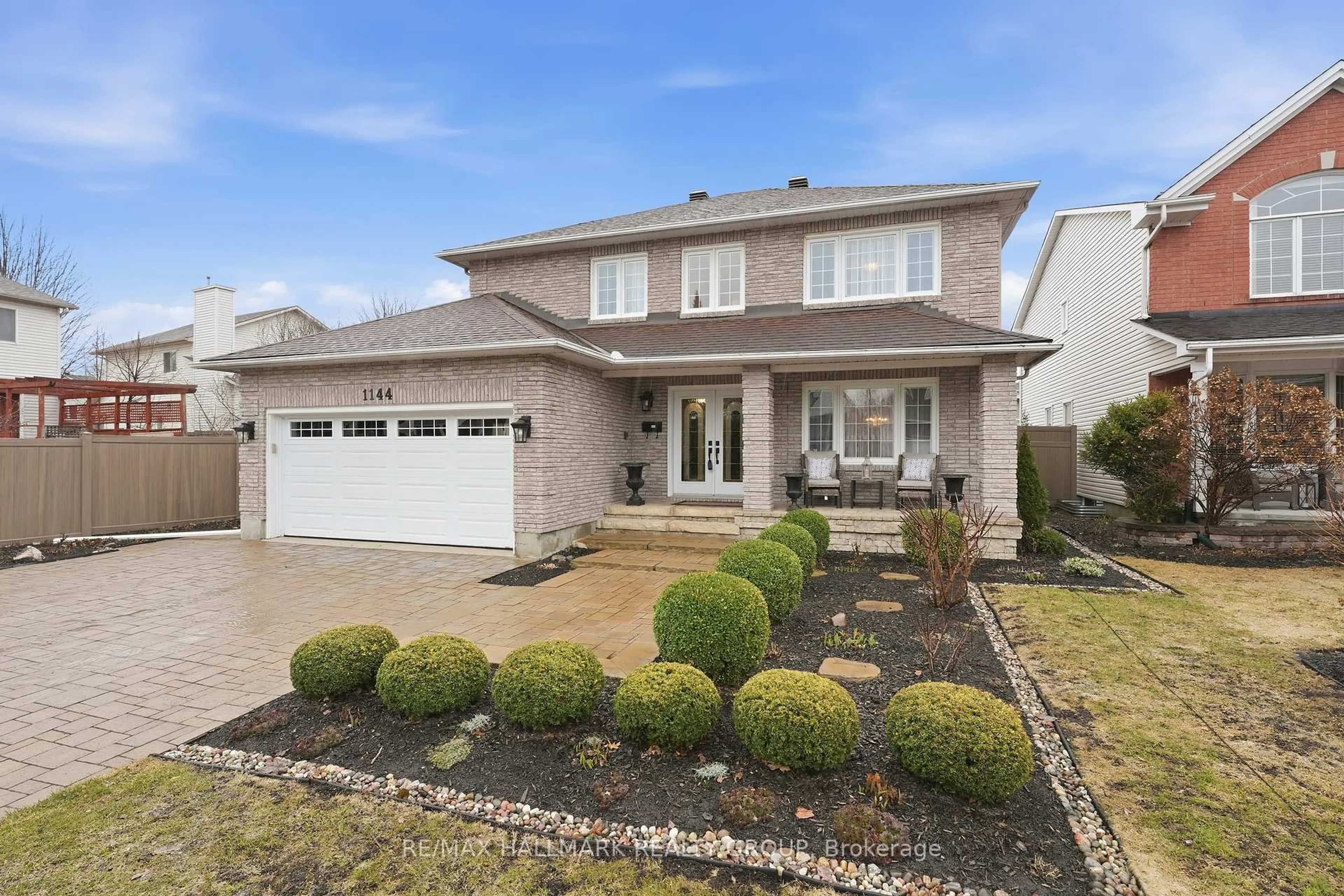 Home with vinyl exterior material, street for 1144 Ambercrest St, Ottawa Ontario K1J 1A9