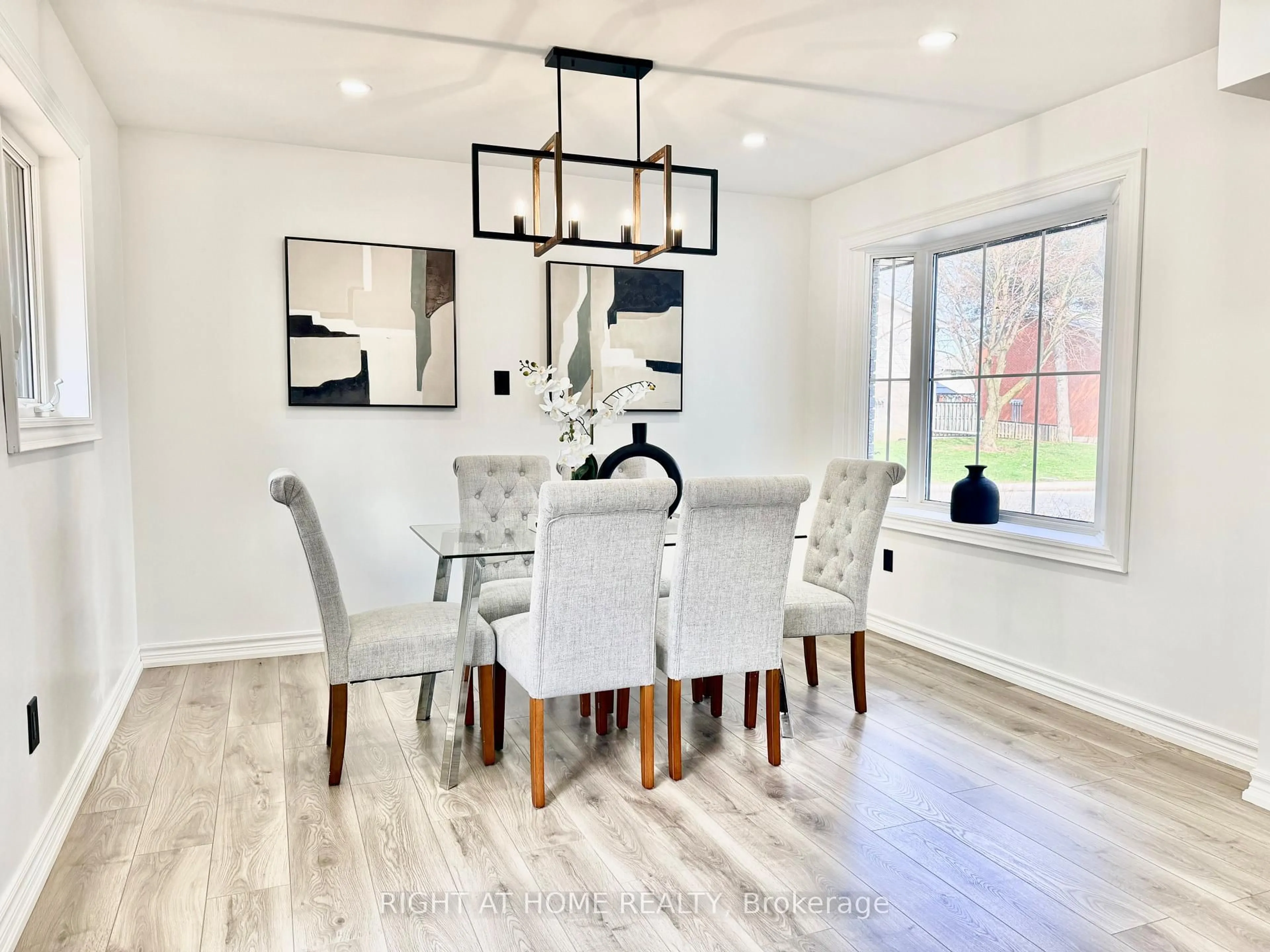 Dining room, wood/laminate floor for 77 Elford Cres, Hamilton Ontario L8K 5K8