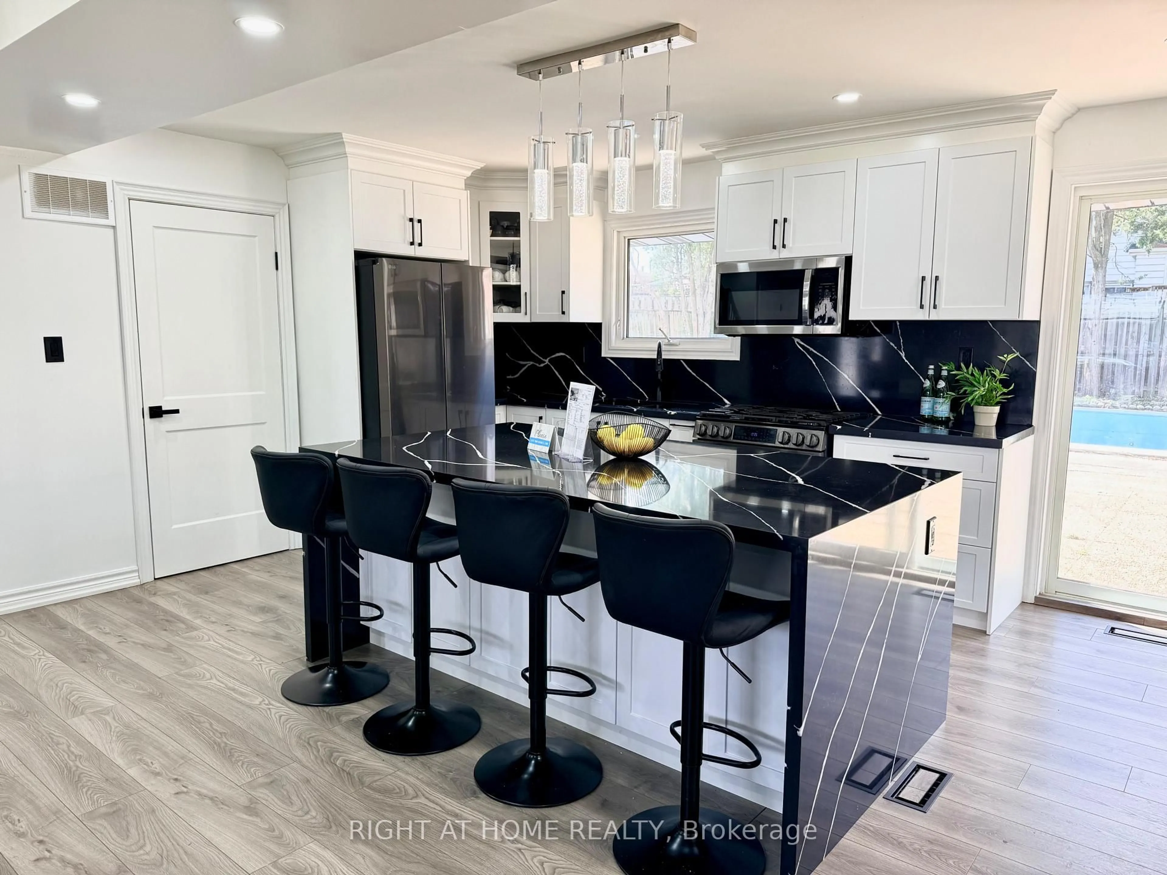 Open concept kitchen, ceramic/tile floor for 77 Elford Cres, Hamilton Ontario L8K 5K8