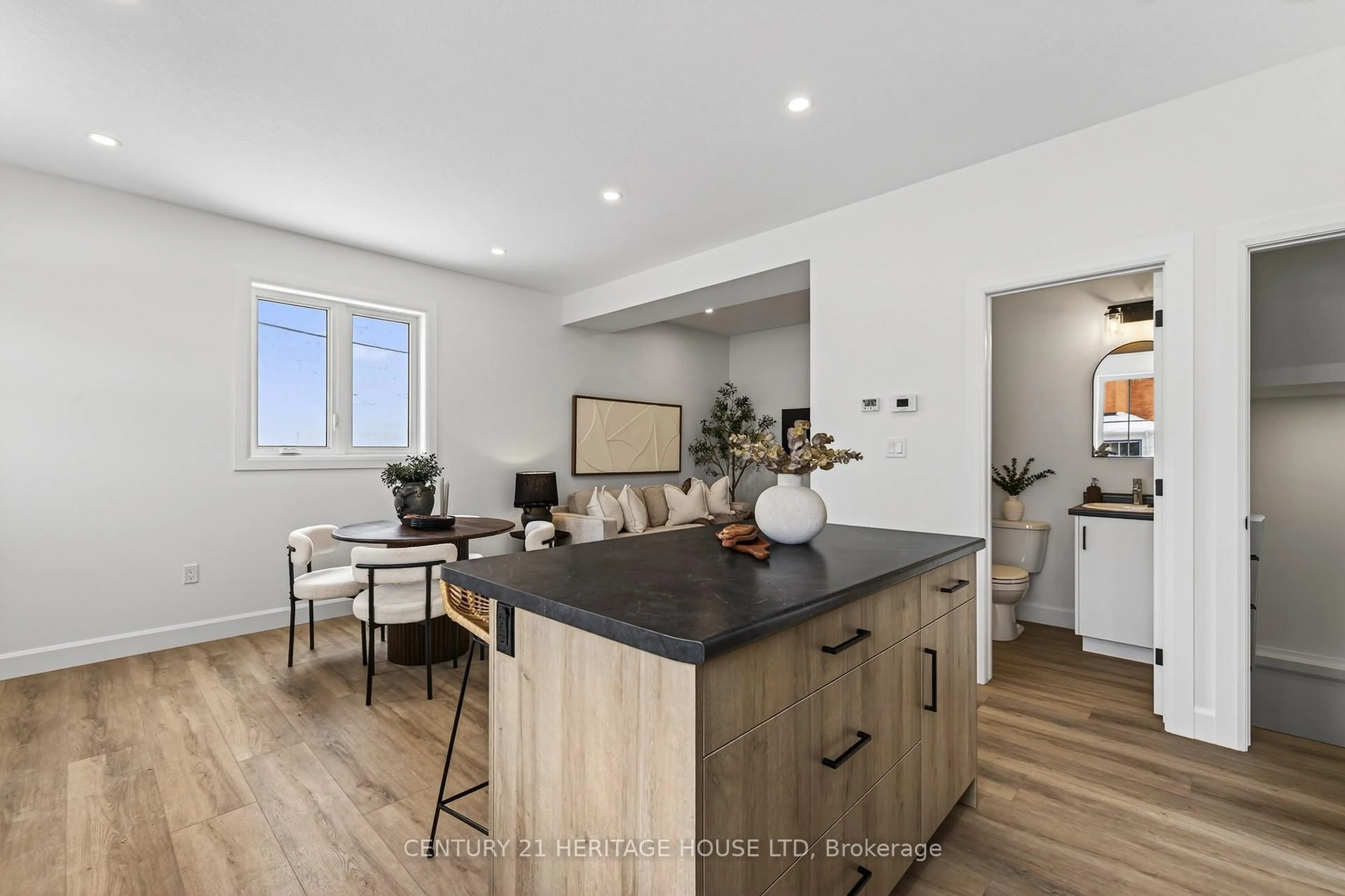 Open concept kitchen, wood/laminate floor for 51183 Ron Mcneil Line, Malahide Ontario N0L 2J0