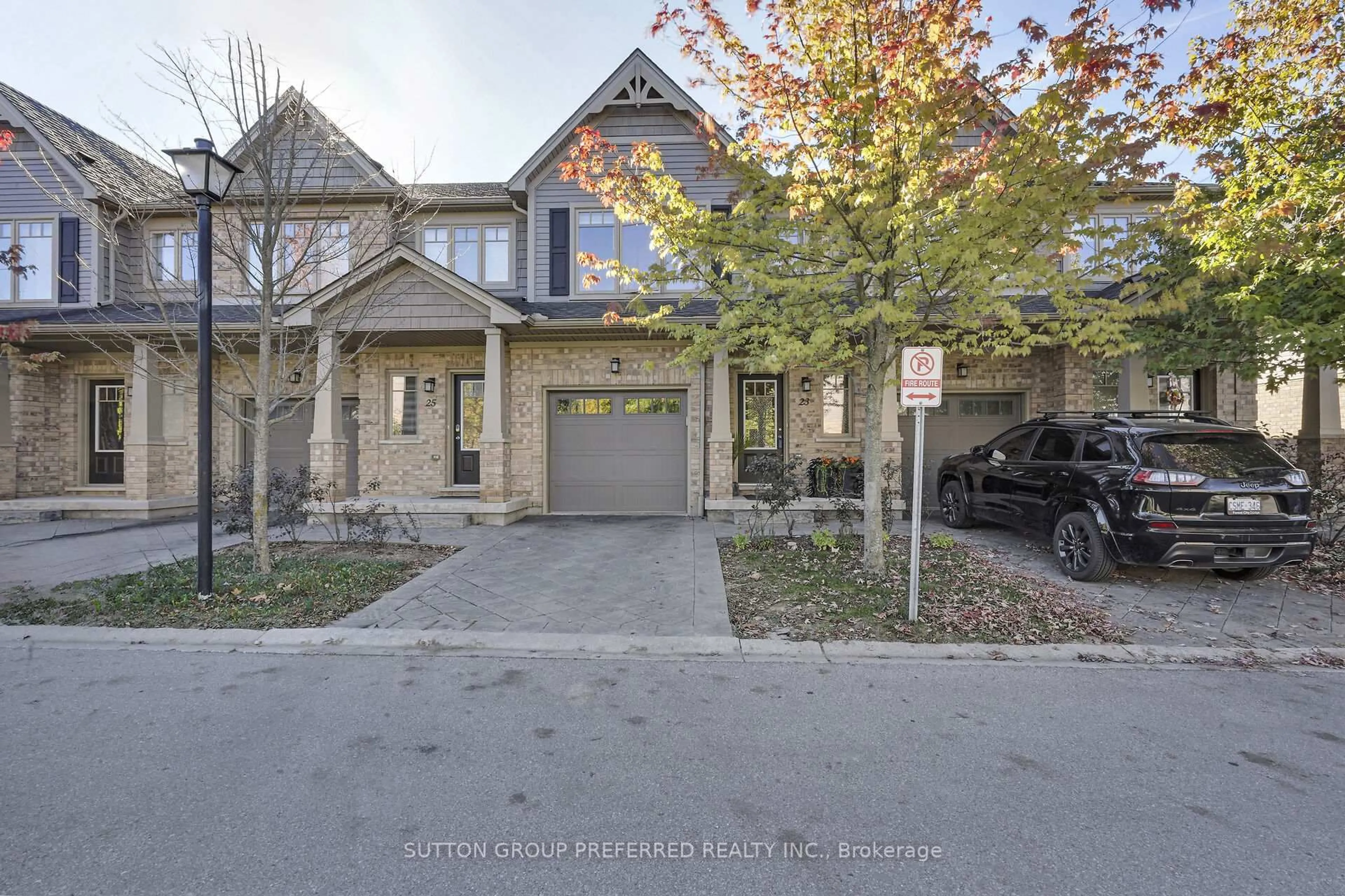 A pic from outside/outdoor area/front of a property/back of a property/a pic from drone, street for 1924 Cedarhollow Blvd #23, London North Ontario N5X 0C3