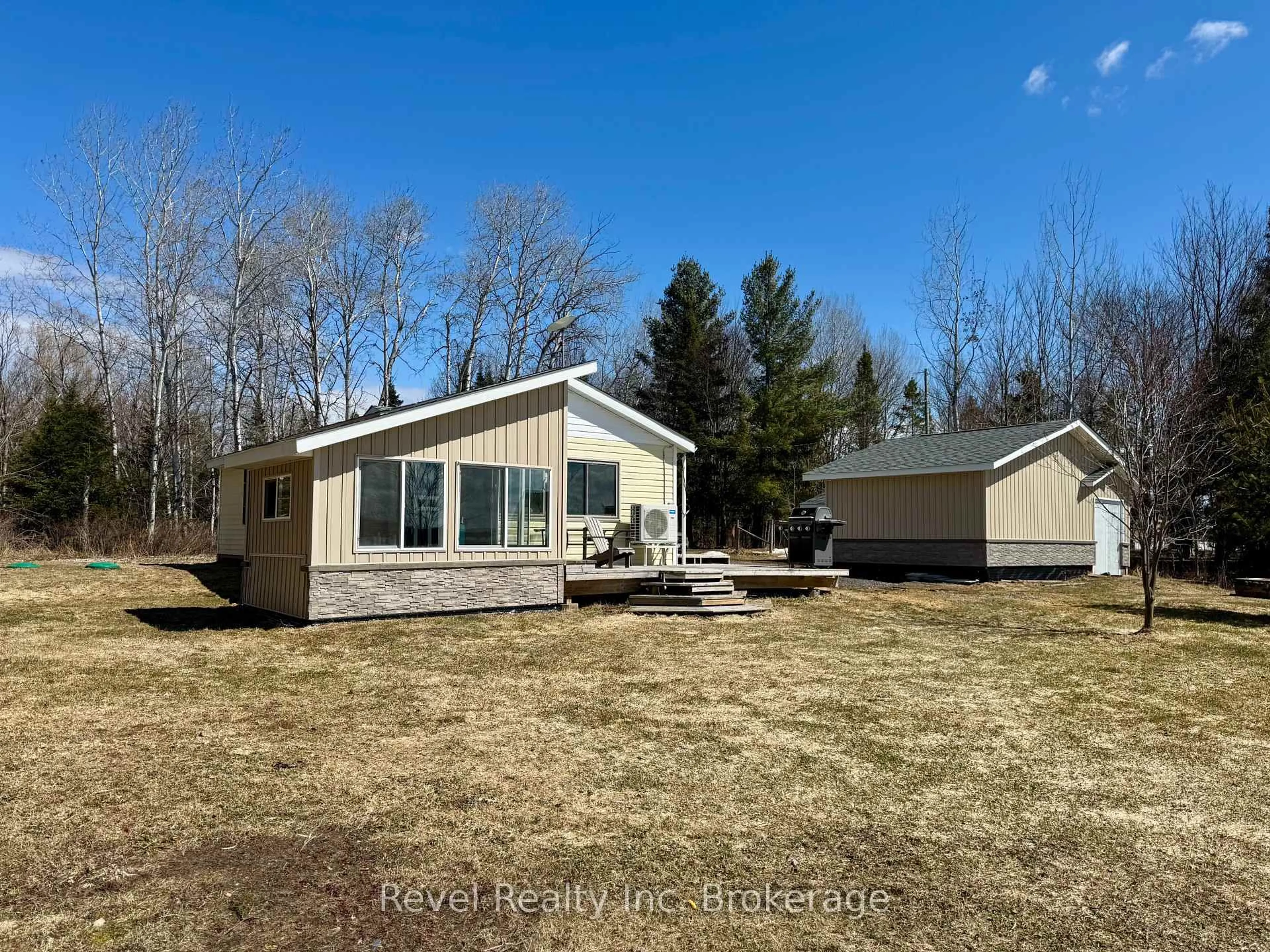 A pic from outside/outdoor area/front of a property/back of a property/a pic from drone, water/lake/river/ocean view for 286 Mallard Haven Rd, Chisholm Ontario P0H 1B0