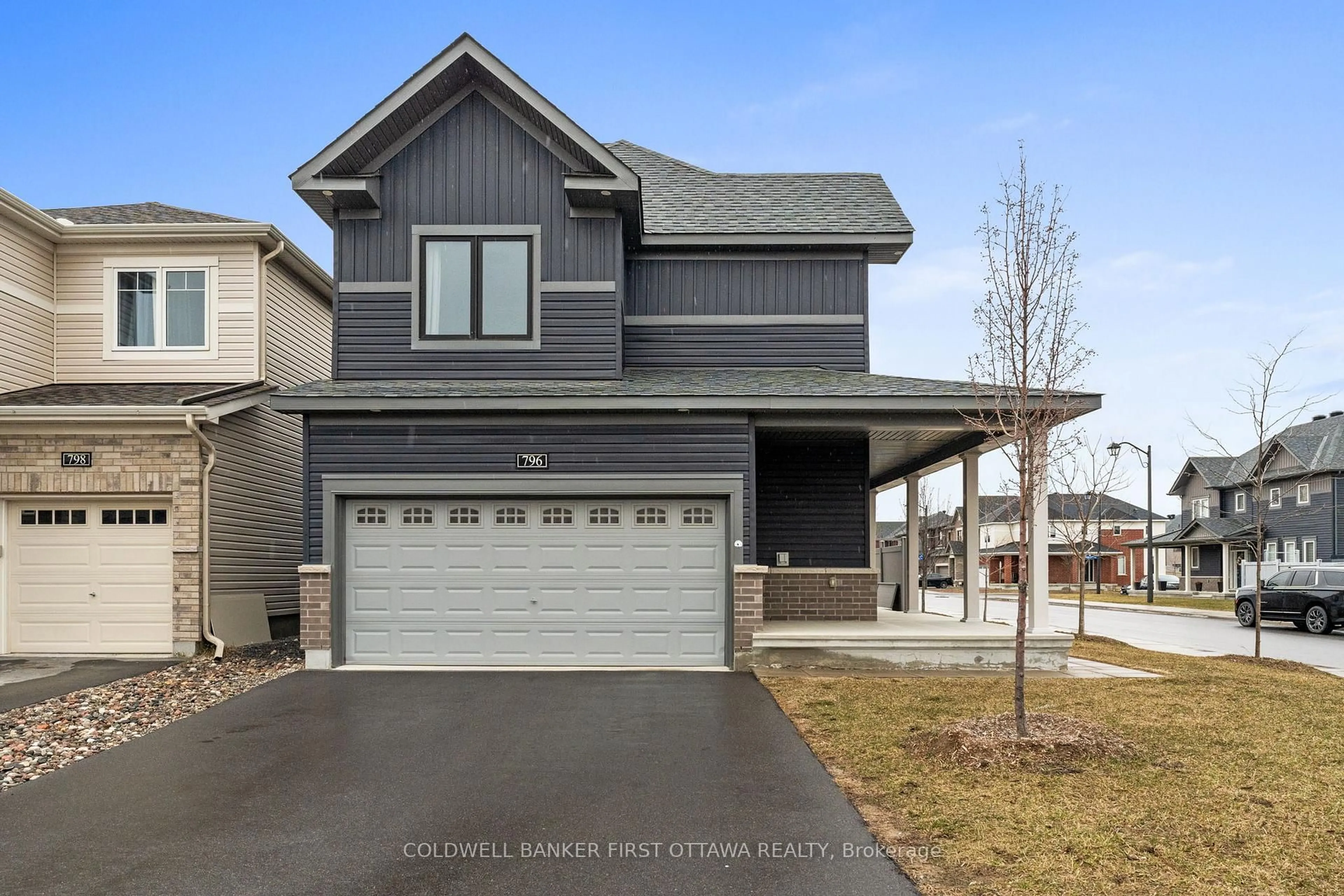 Home with vinyl exterior material, street for 796 Cappamore Dr, Ottawa Ontario K2J 6V6
