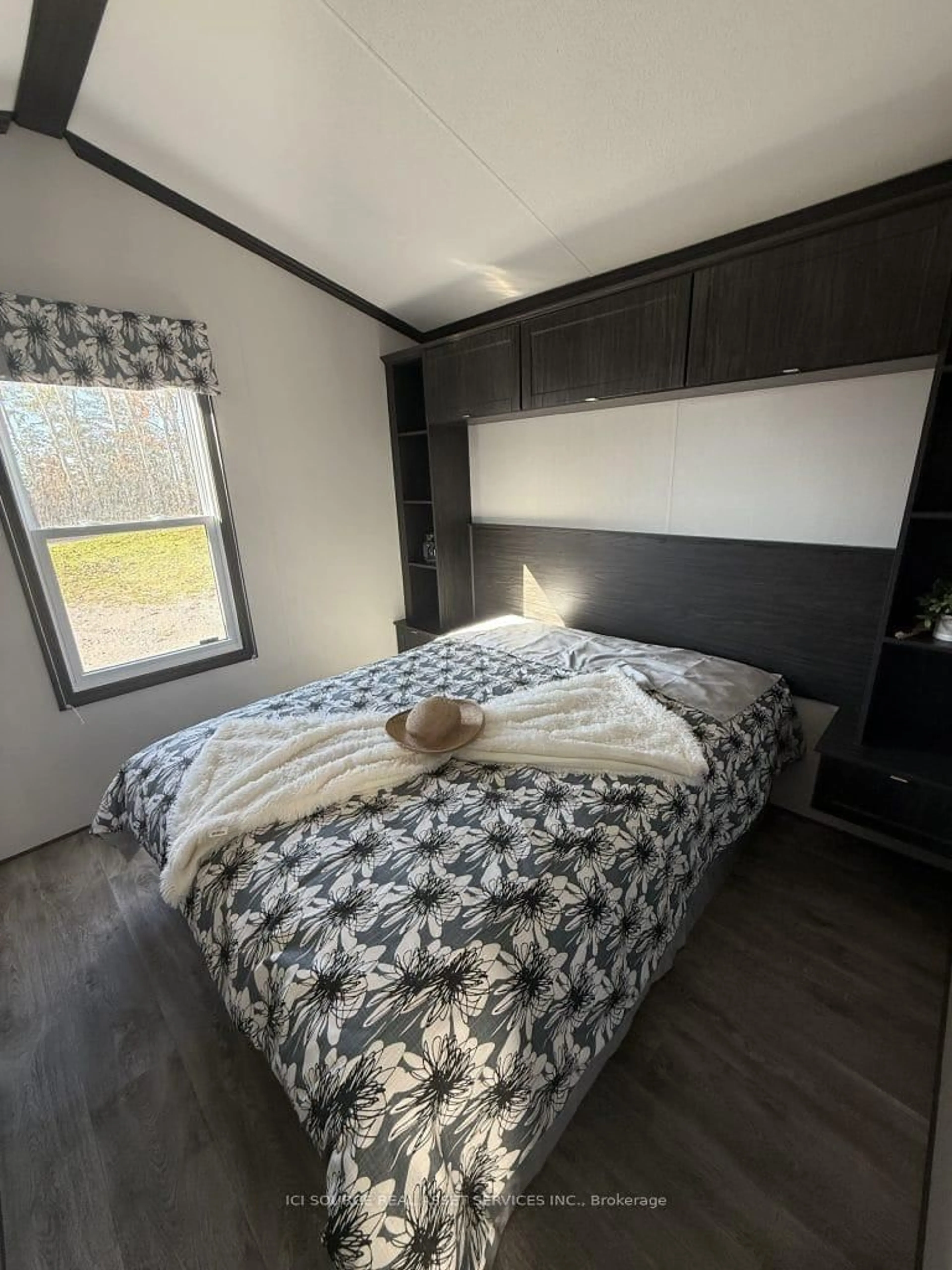 Bedroom with bed, unknown for 1047 Bonnie Lake Camp Rd #TRILM, Bracebridge Ontario P1L 1W9