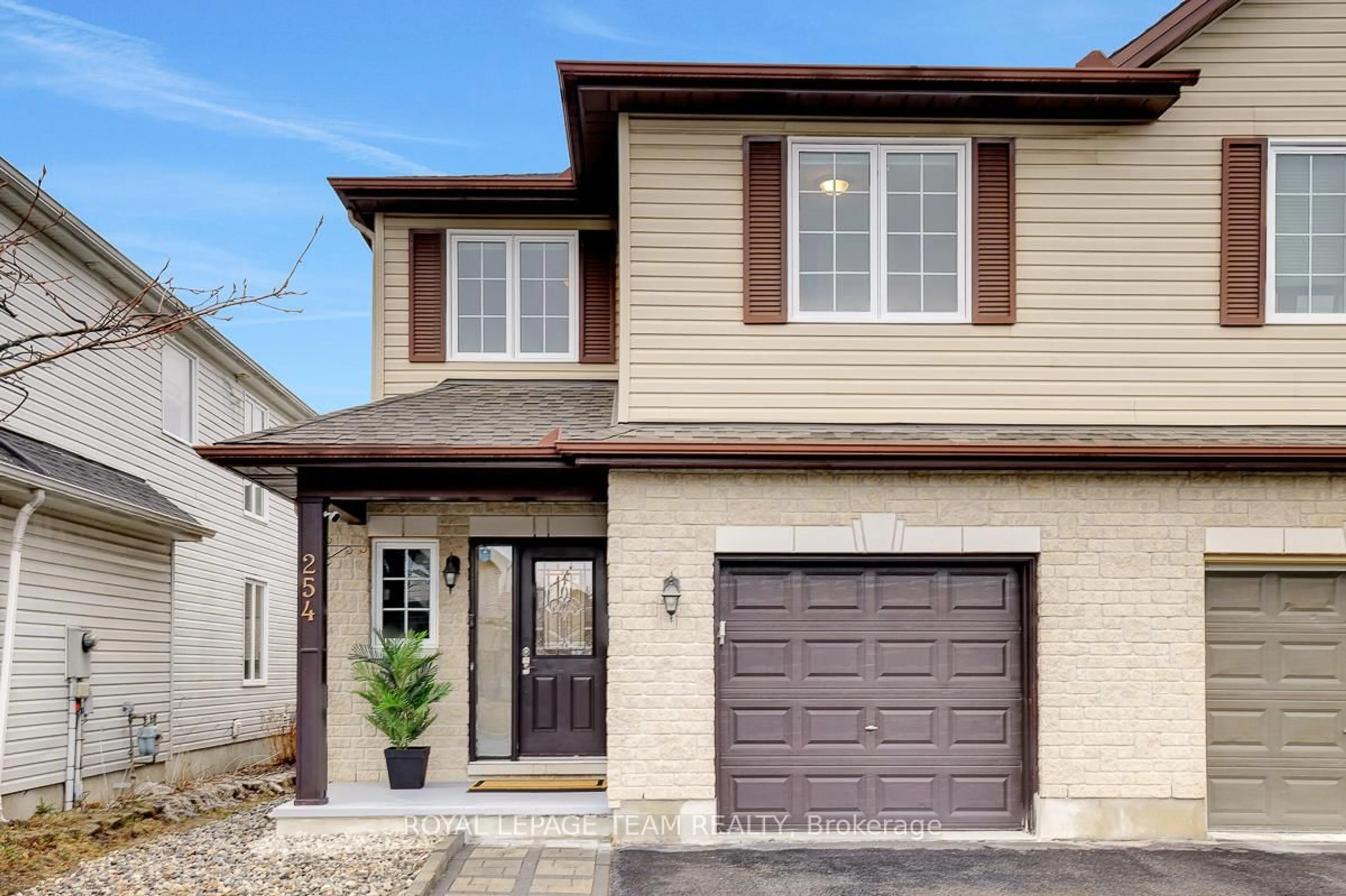 Home with brick exterior material, street for 254 Tewsley Dr, Ottawa Ontario K1V 0Y6
