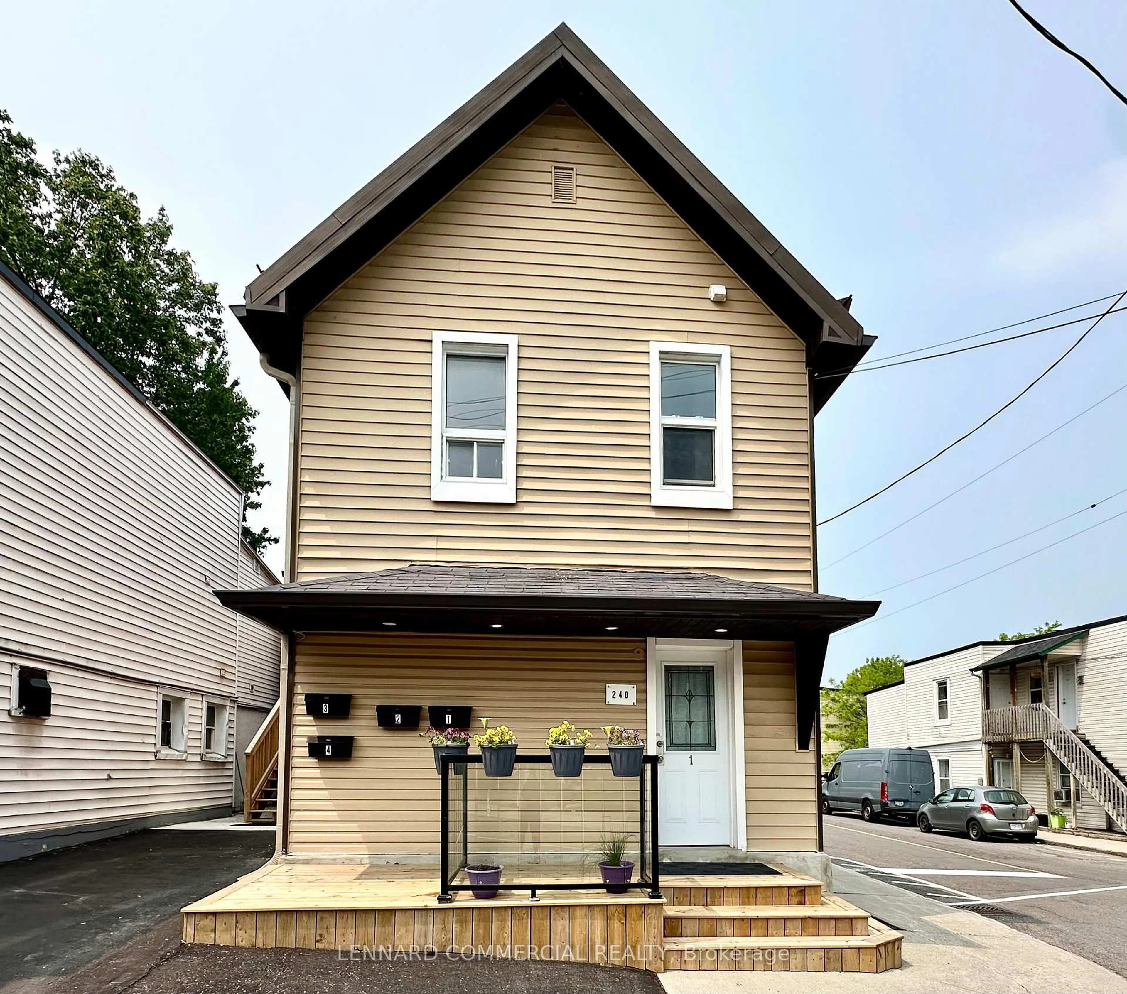 Home with vinyl exterior material, street for 240 MARIER Ave, Ottawa Ontario K1L 5R1