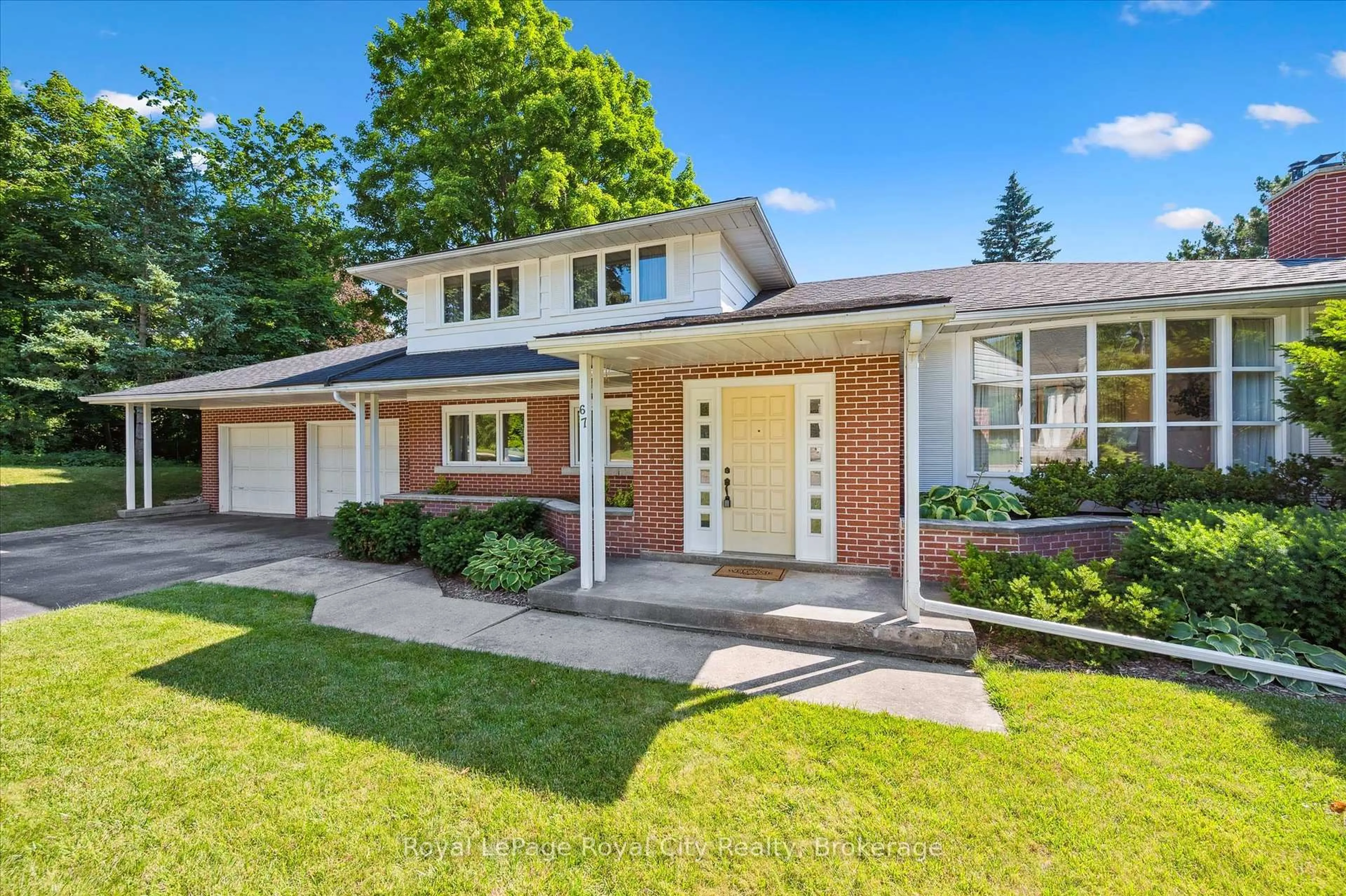 Home with brick exterior material, street for 67 Woodside Rd, Guelph Ontario N1G 2H1