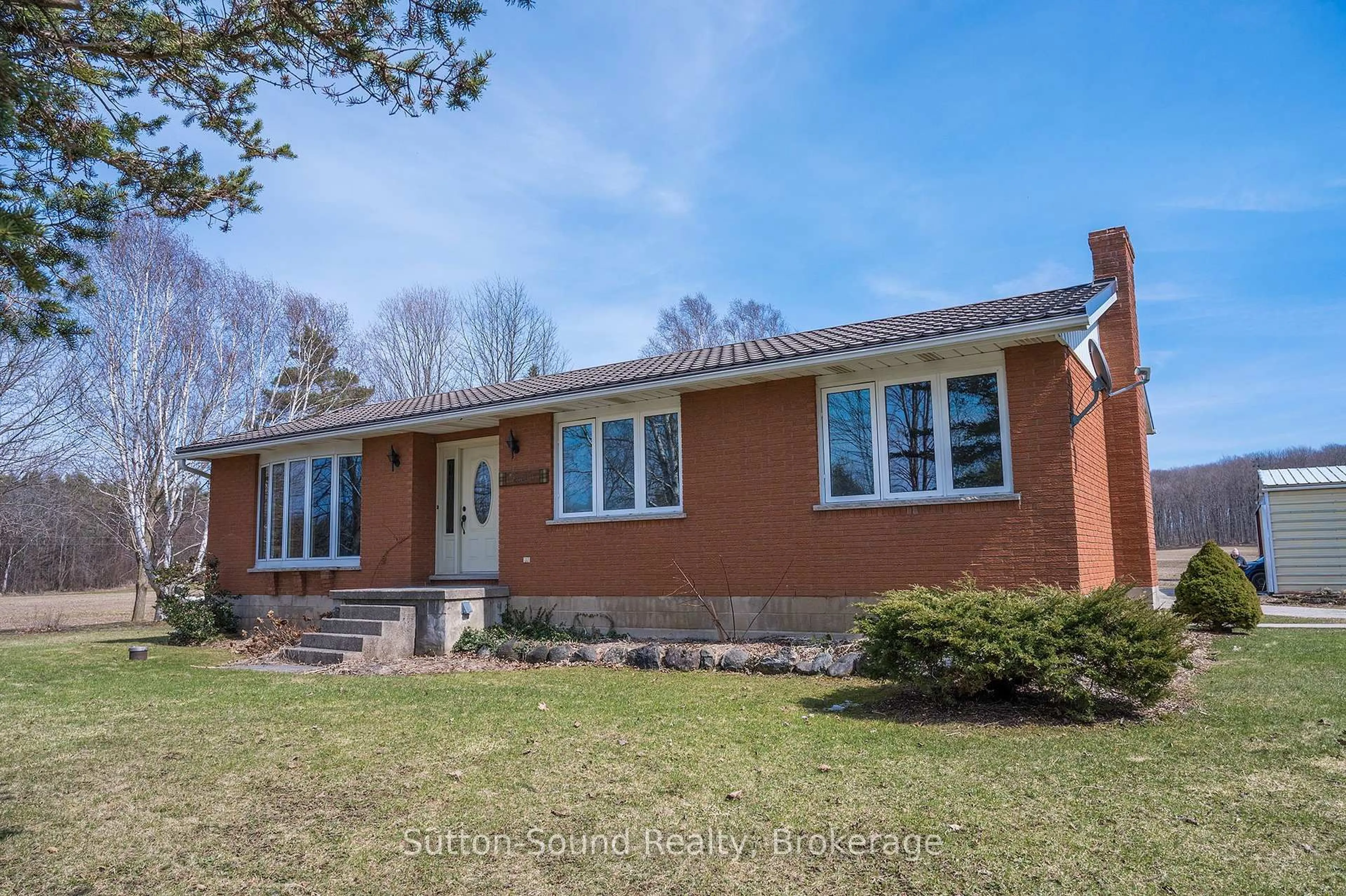 Home with brick exterior material, street for 458523 8 Concession, Meaford Ontario N4K 5W4