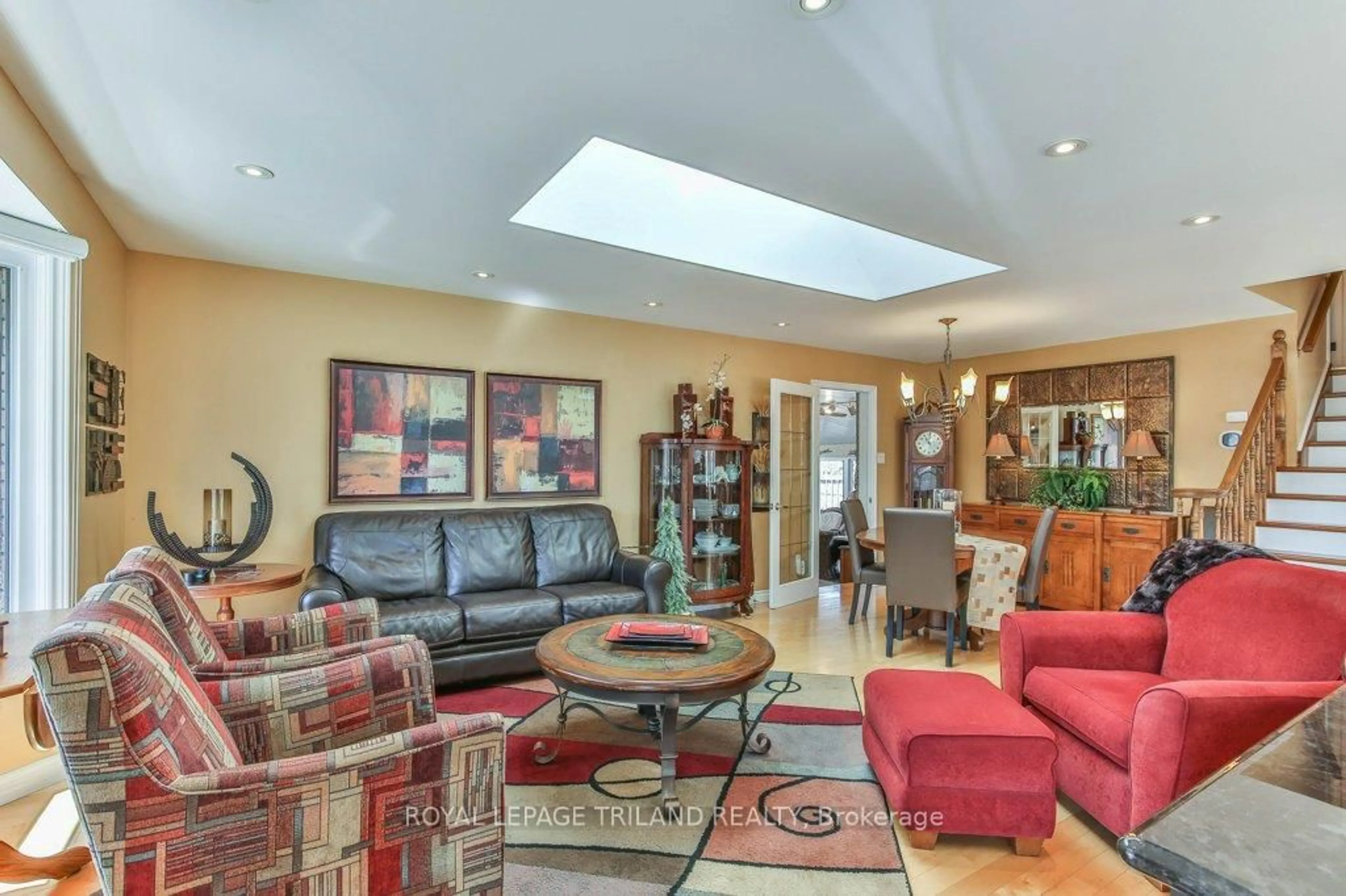 Living room with furniture, ceramic/tile floor for 1221 GLENORA Dr, London North Ontario N5X 2P6