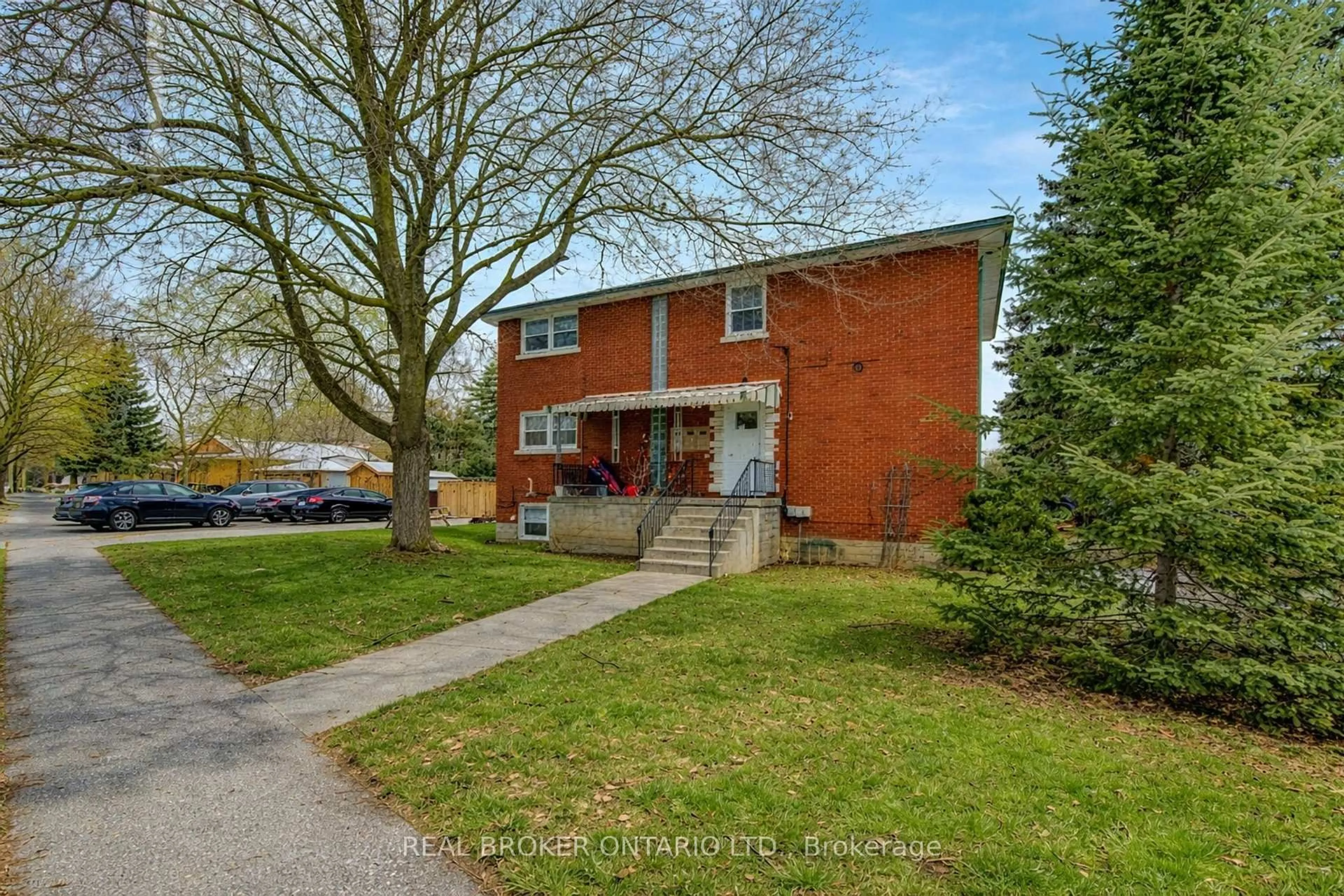 Home with brick exterior material, street for 109 Eton Dr, Kitchener Ontario N2B 1N1