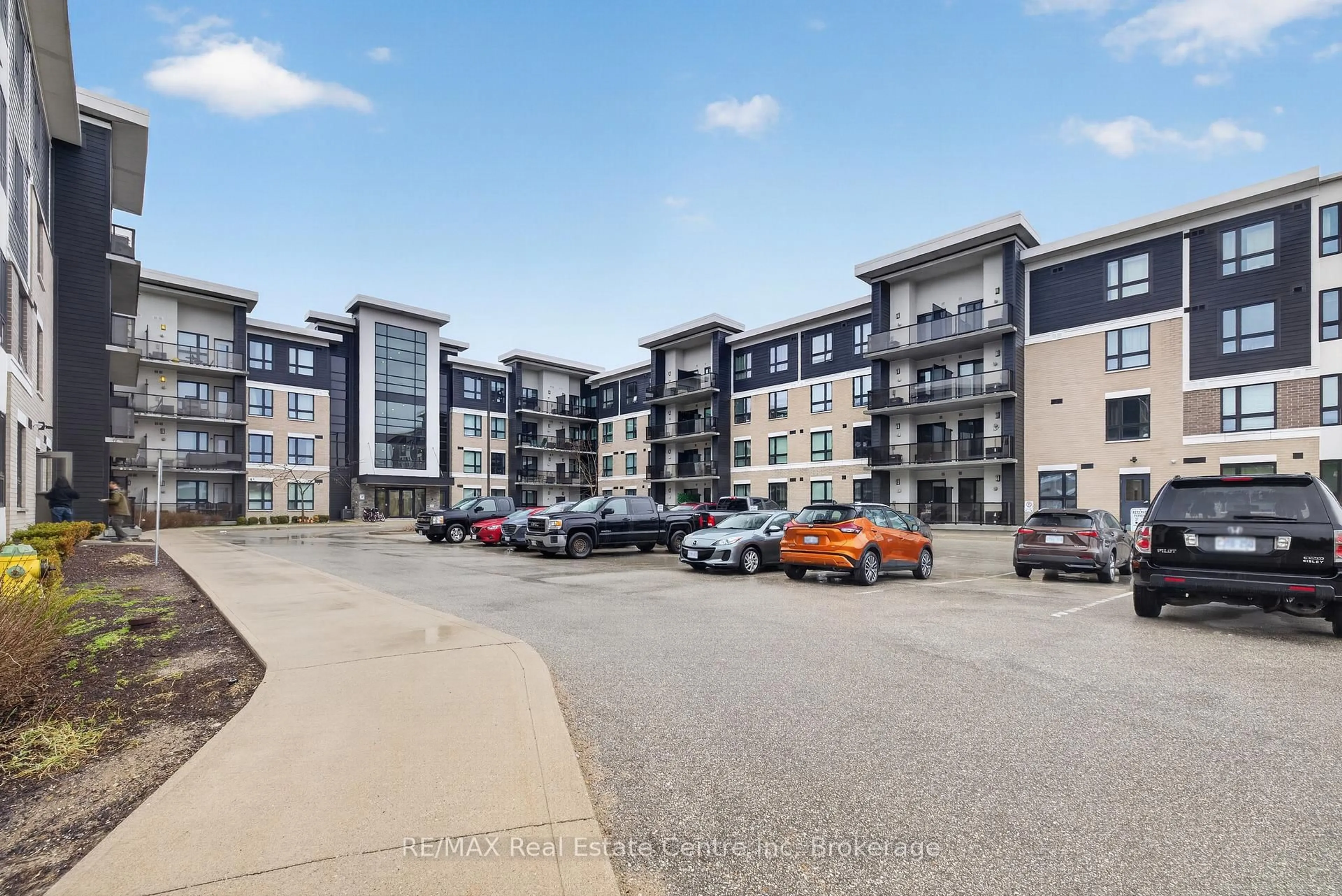 A pic from outside/outdoor area/front of a property/back of a property/a pic from drone, unknown for 1284 Gordon St #113, Guelph Ontario N1L 0M8